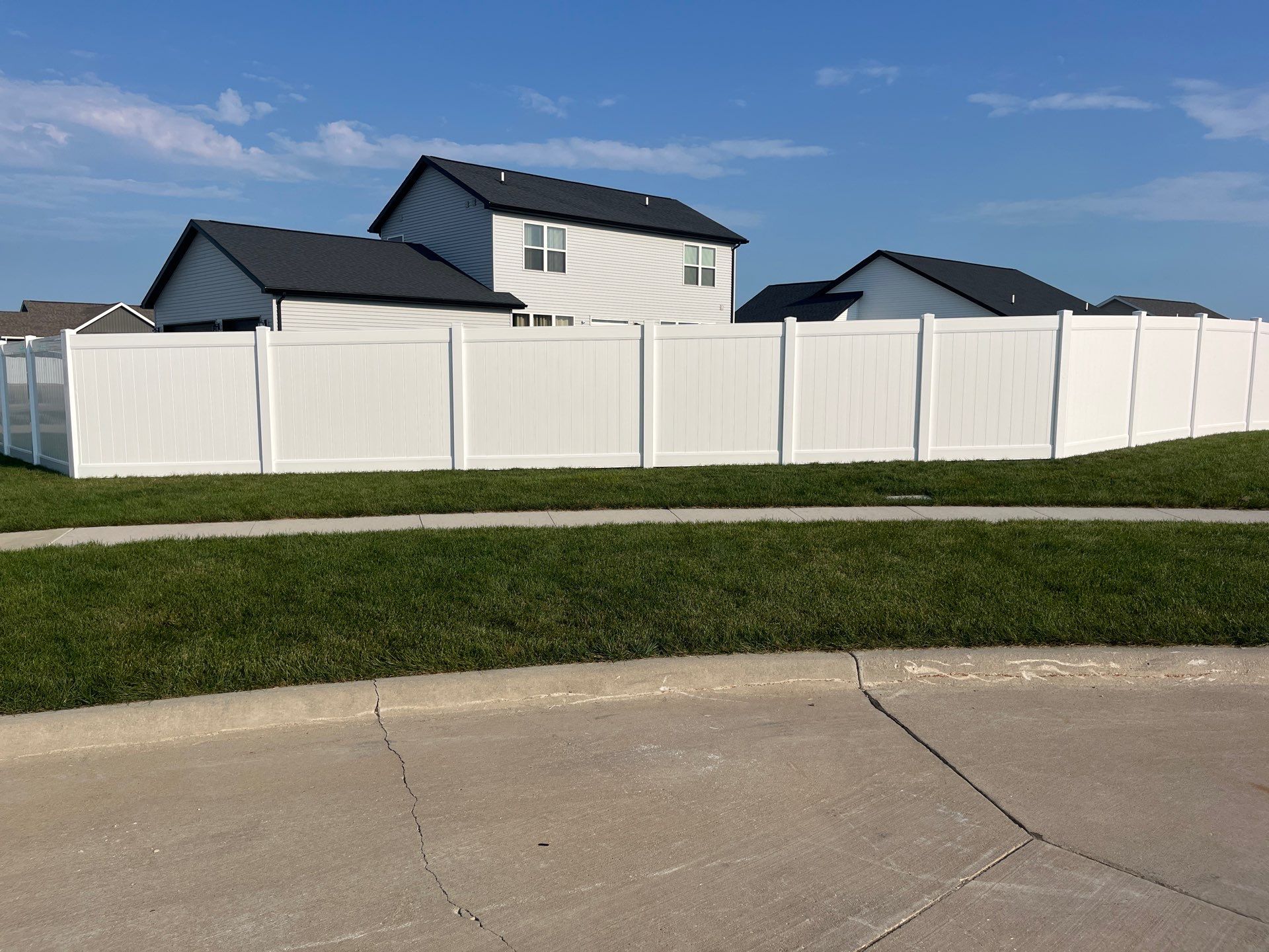 White Vinyl Privacy Fence Installation With Double Gates in Waterloo by Perfect Picket Fence and Stain
