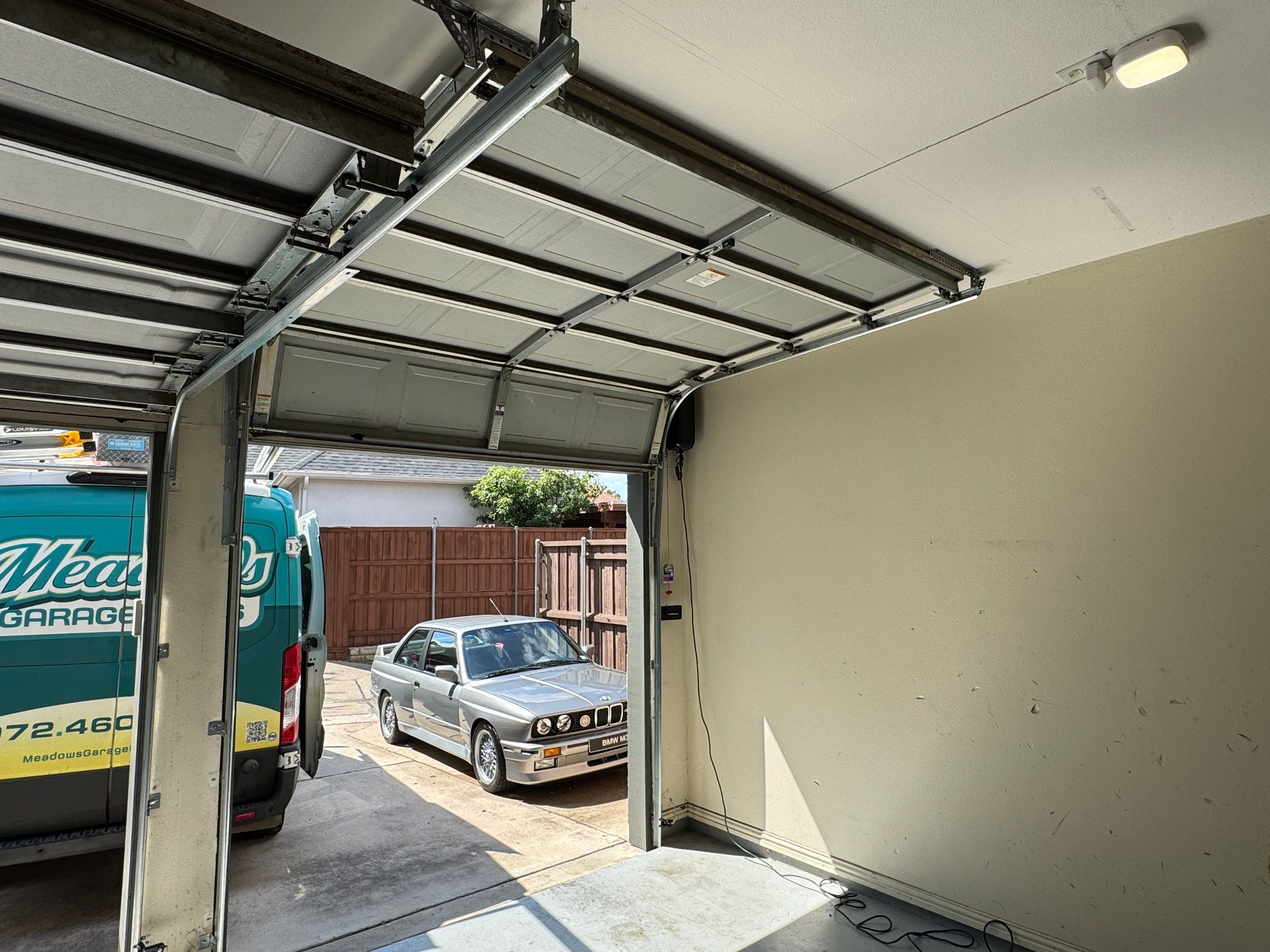 LiftMaster Side Mount Opener and High-Lift Track Installation in Plano by Meadows Garage Doors