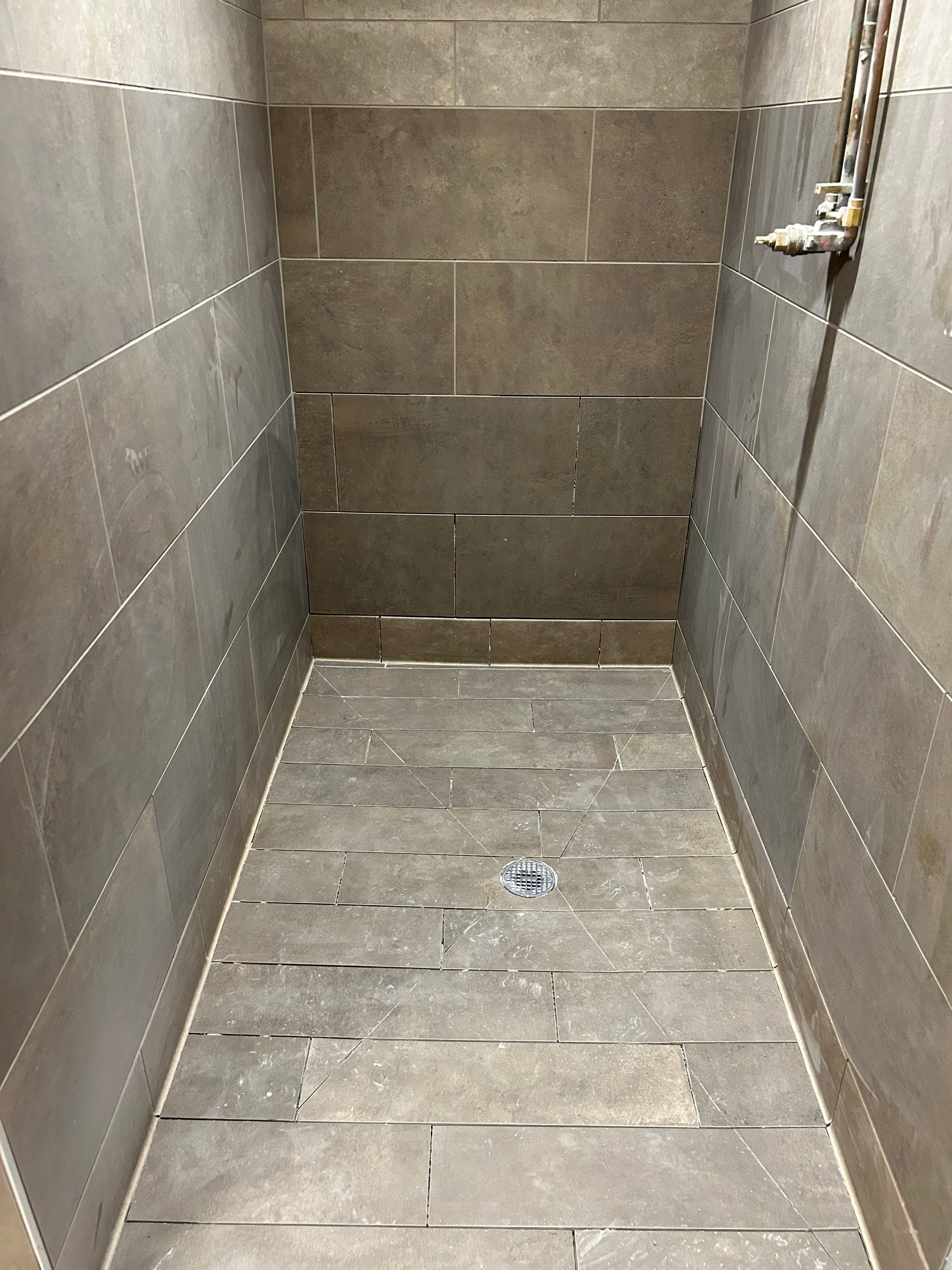 Trucking company showers by Footprints Floors of Nashville