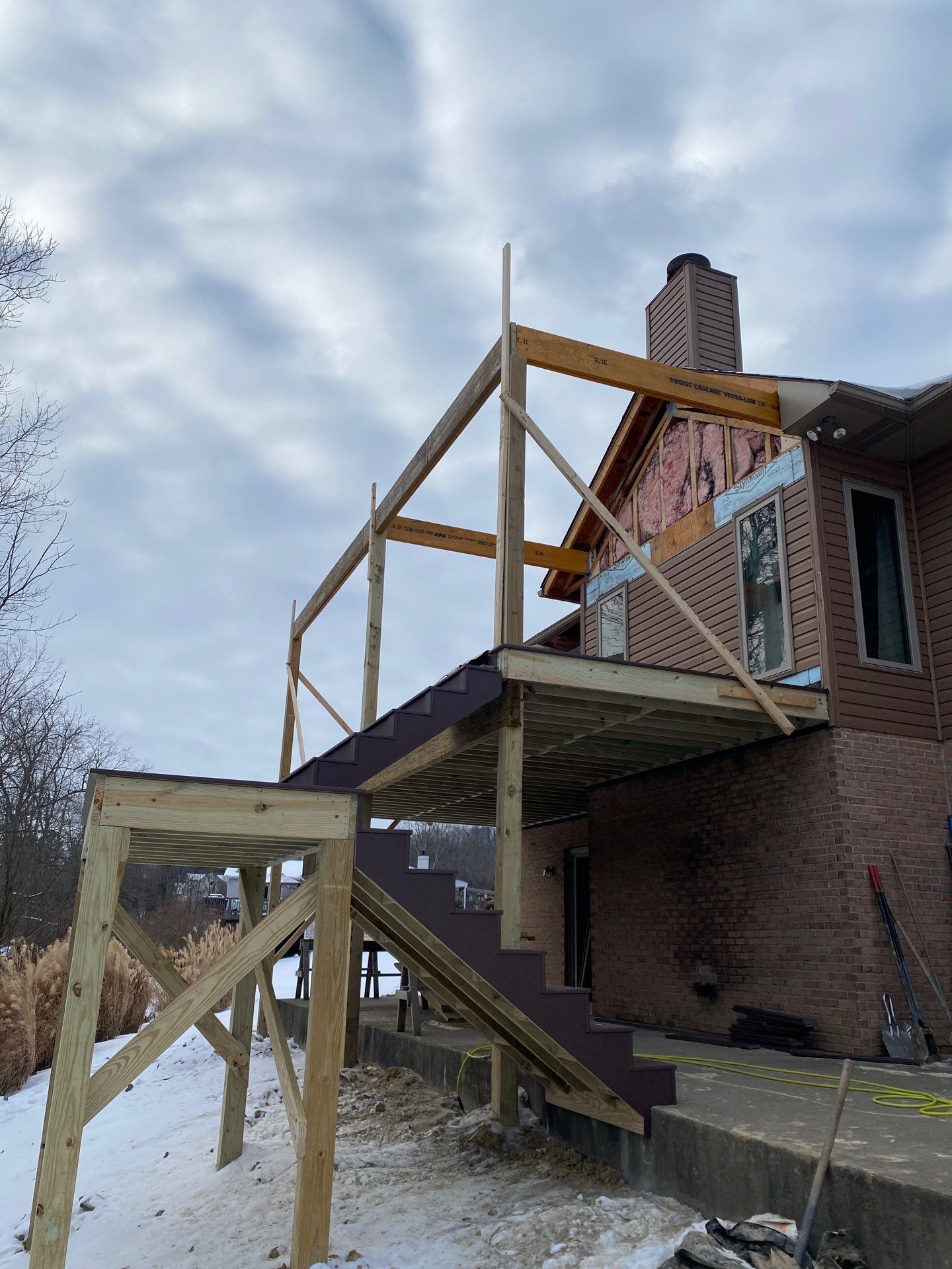 Deck and Roof Build by Cousins Roofing Siding & Decks