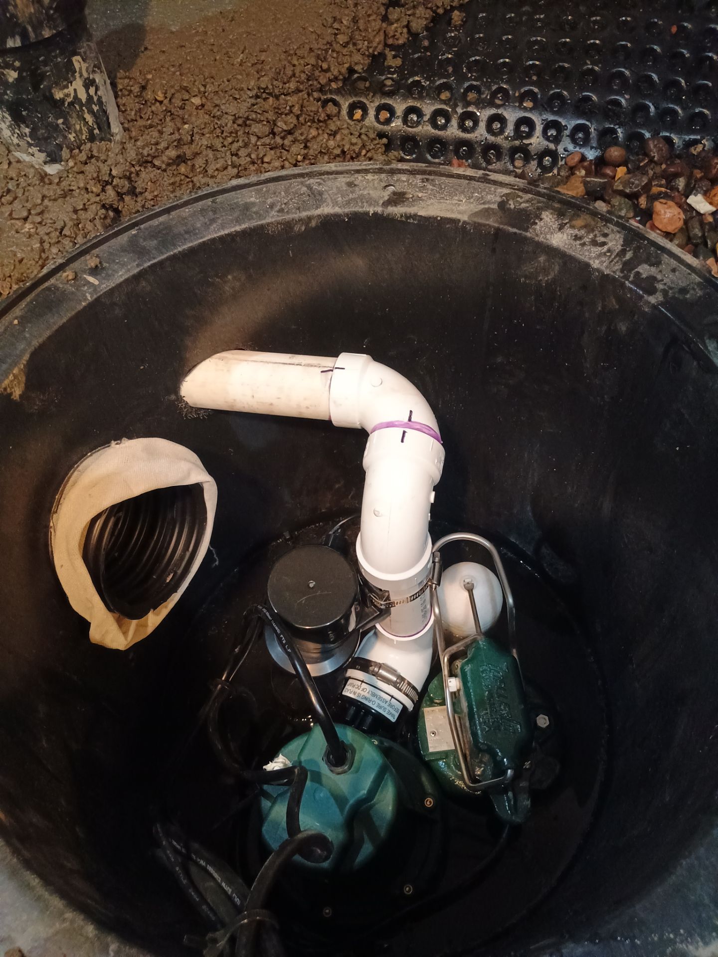 Interior Drain Tile & Sump Pump Installation in St. Paul, MN by Waterproofing Northeast