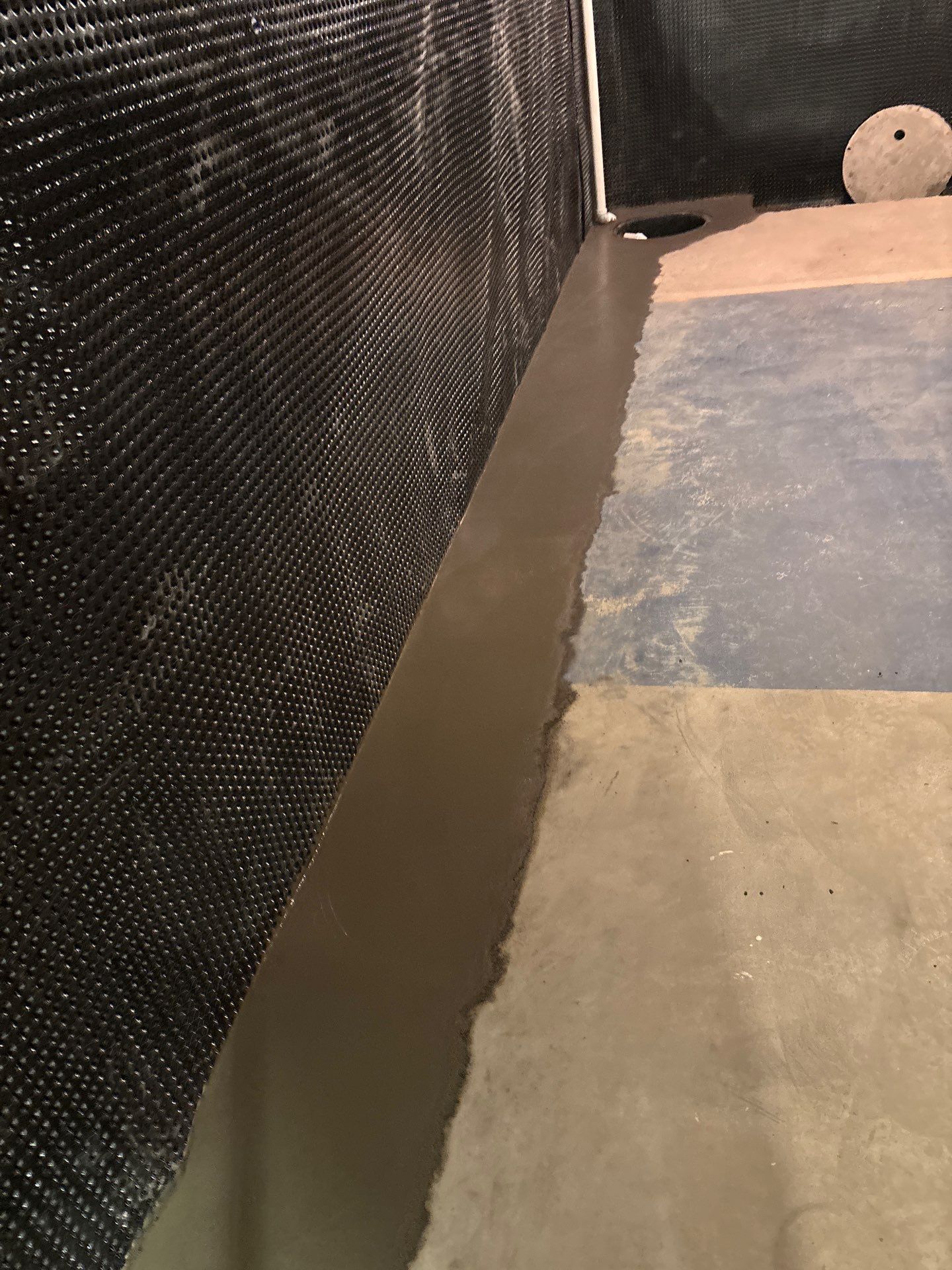 Interior Drain Tile & Buried Discharge in South Minneapolis by Waterproofing Northeast