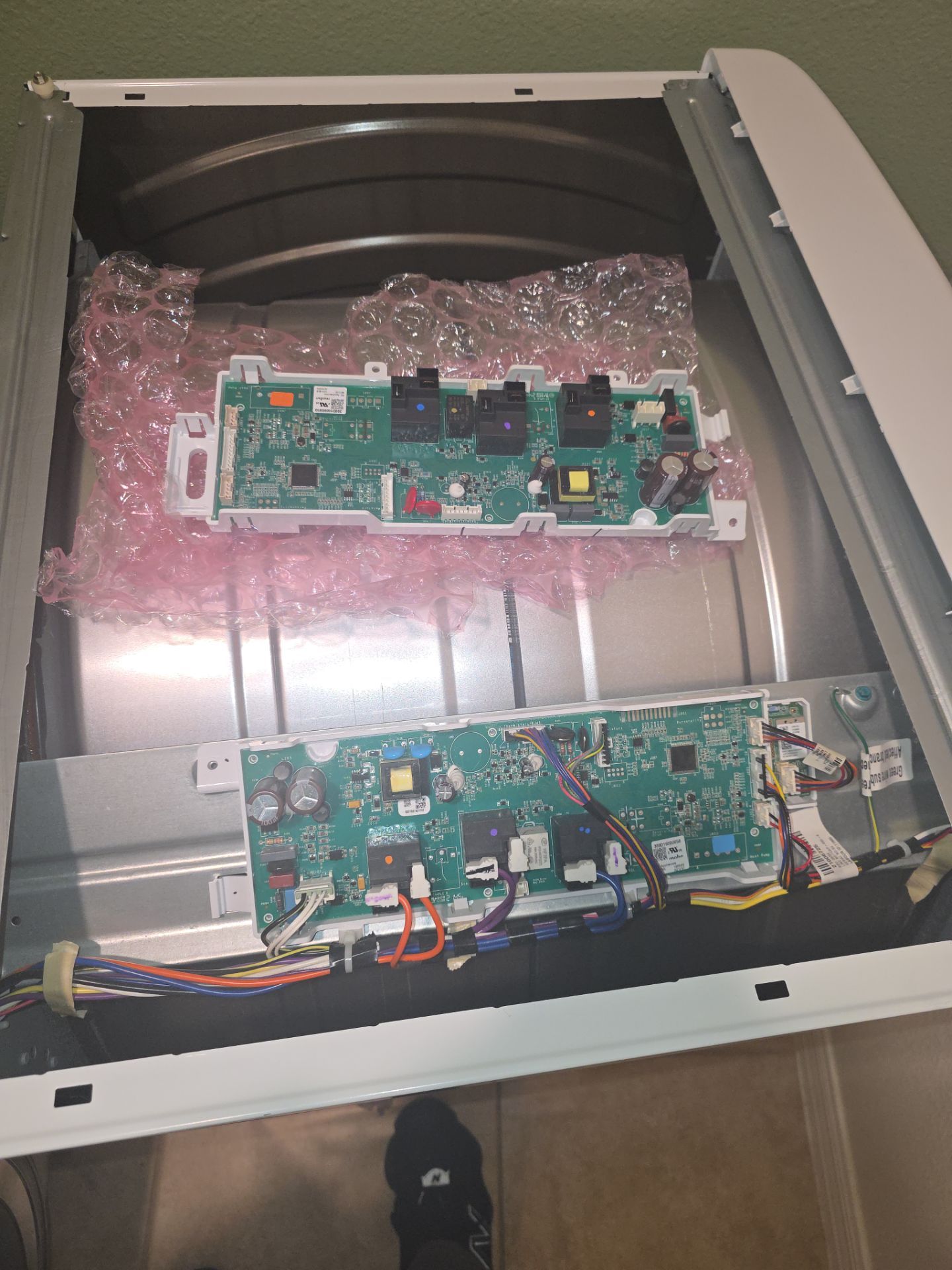 GE Front-Loading Dryer Control Board Replacement in Groveland by AMB-WORKS APPLIANCE REPAIR