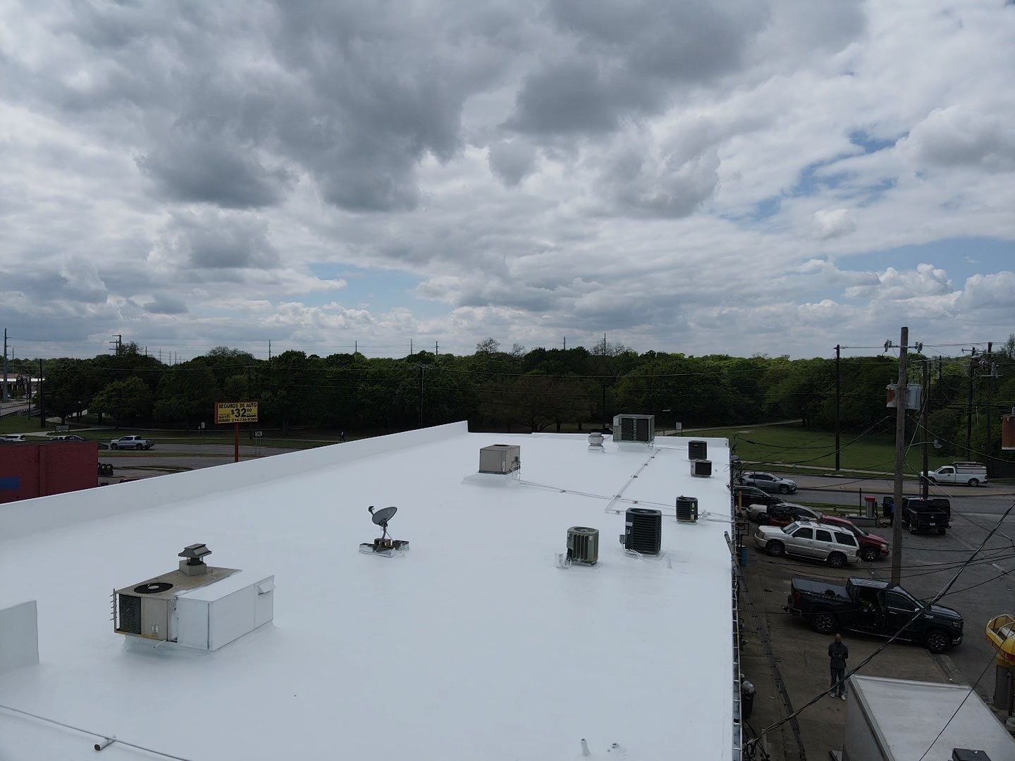 Brauman Group – Garland, TX | EPDM Roof Restoration with OSB, Foam & Coatings by All Star Roofing LLC