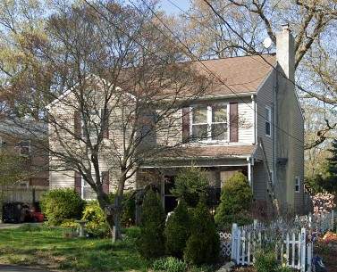 Gutter Installation using 5k White gutters by A Plus Exterior