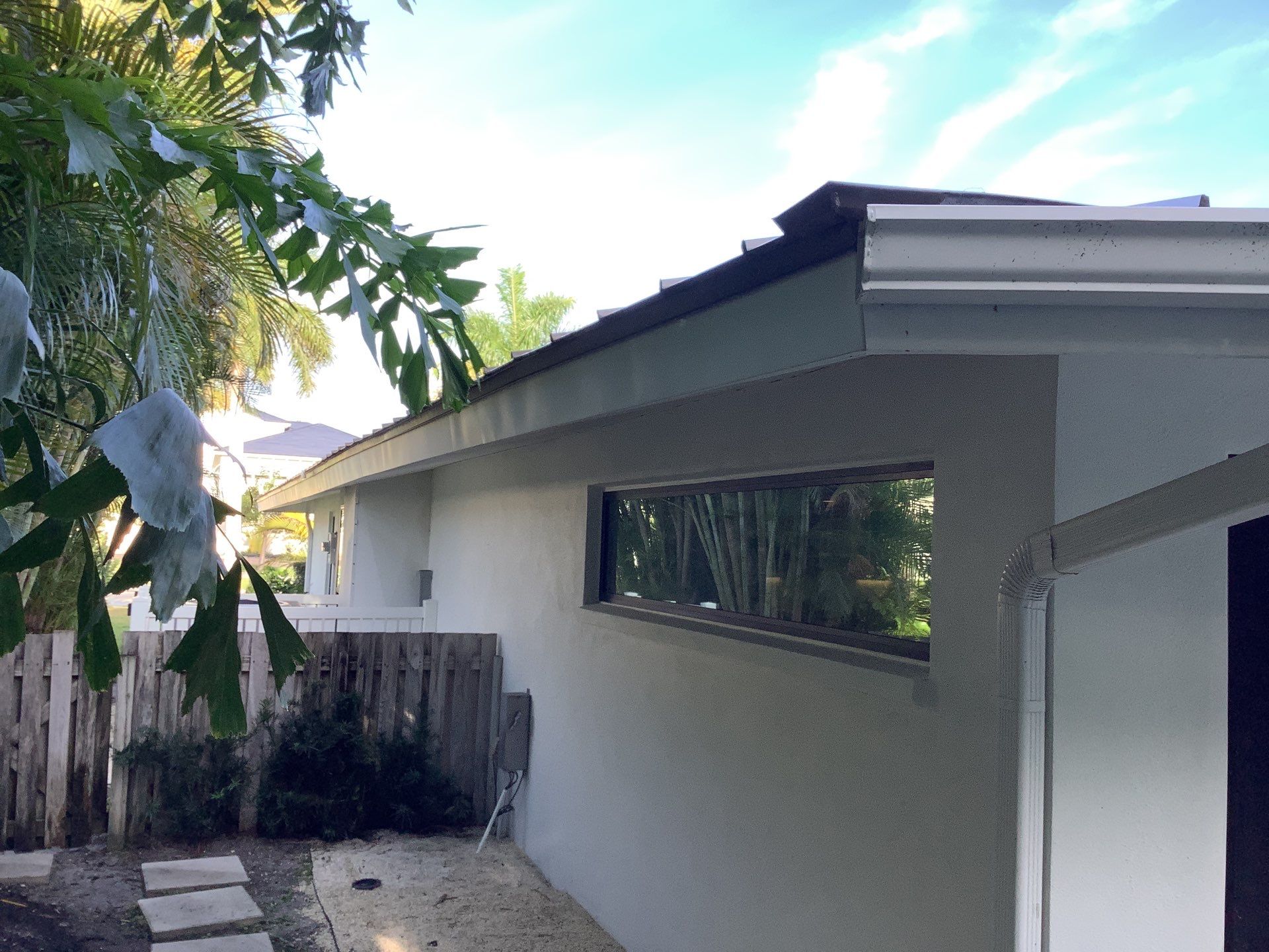 White Seamless Gutters and Downspouts in Sarasota FL by Gutter Professors