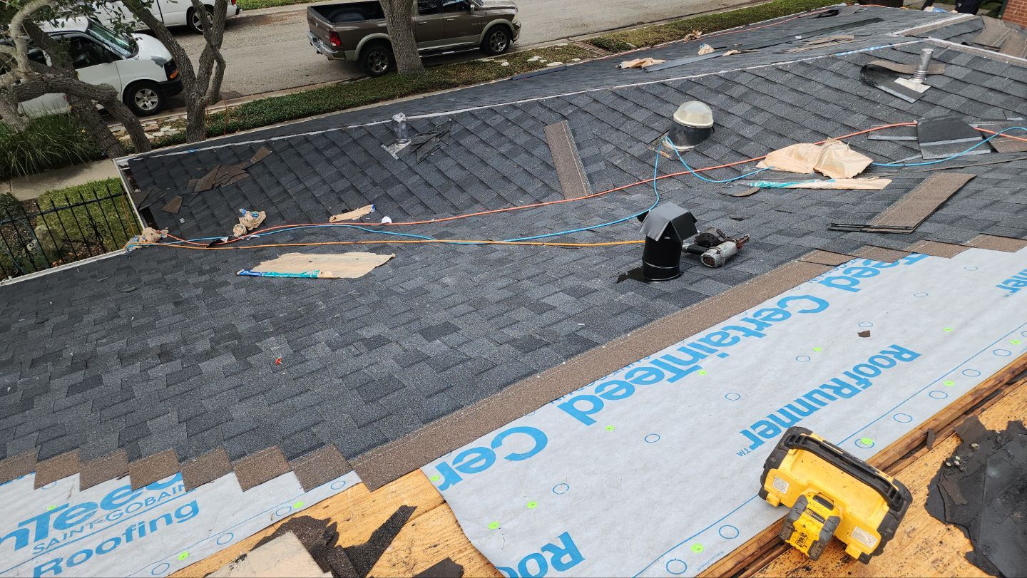 Residential Roofing Installation using Certainteed Landmark Moire Black by Galvan Roofing and Construction