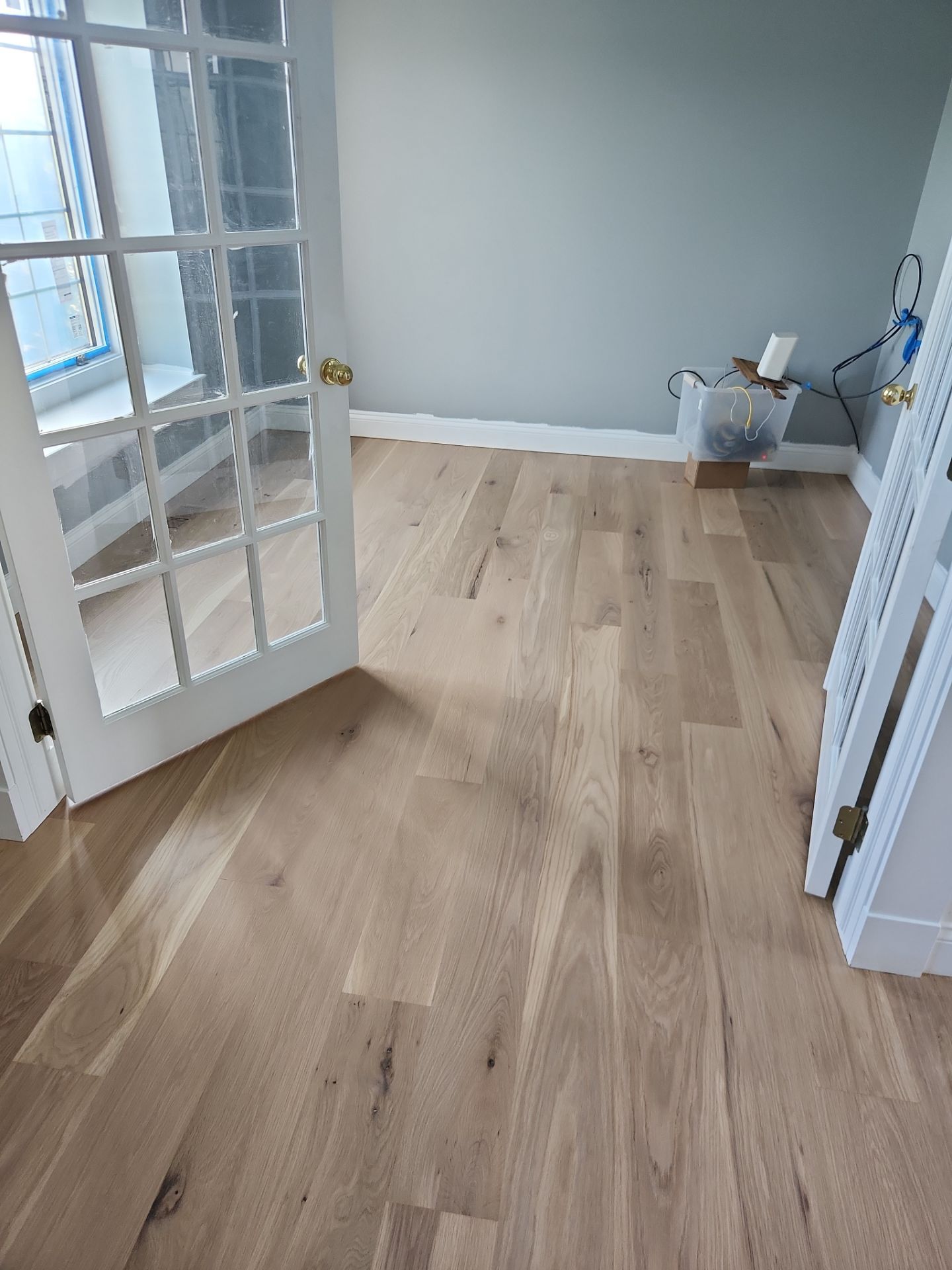  7 inch wide engineered  White Oak site sand and finish by Ann Arbor Hardwoods 