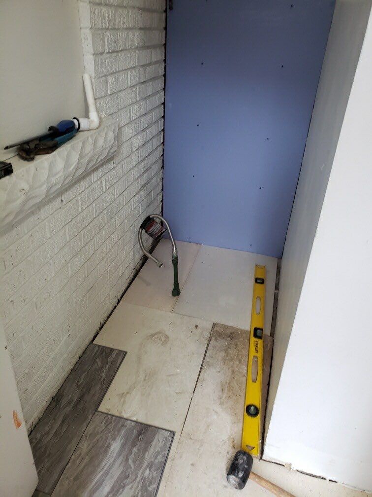 Bathroom Remodel using BCI Acrylic Shower System by Secure Construction Company Inc