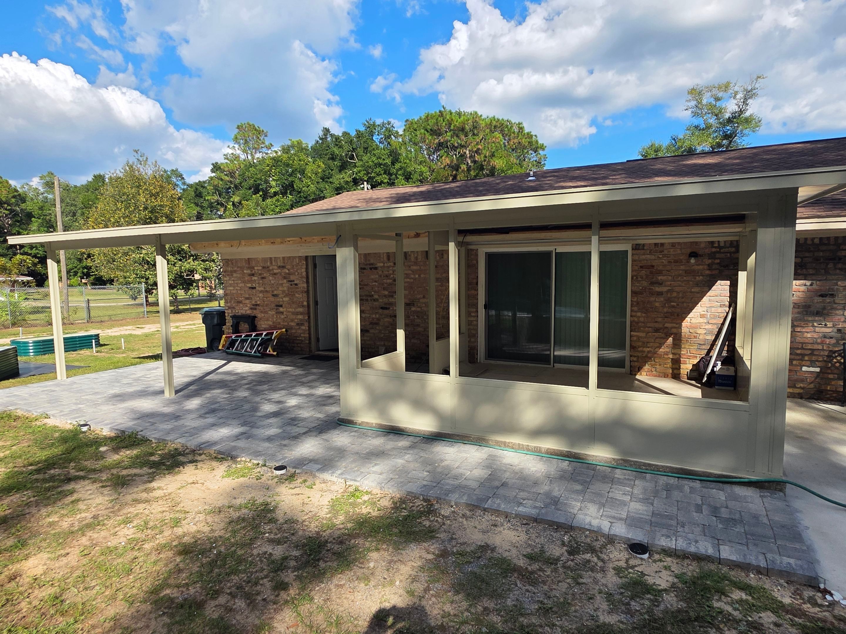 Sunroom Addition and Covered Patio by Titan Sunrooms