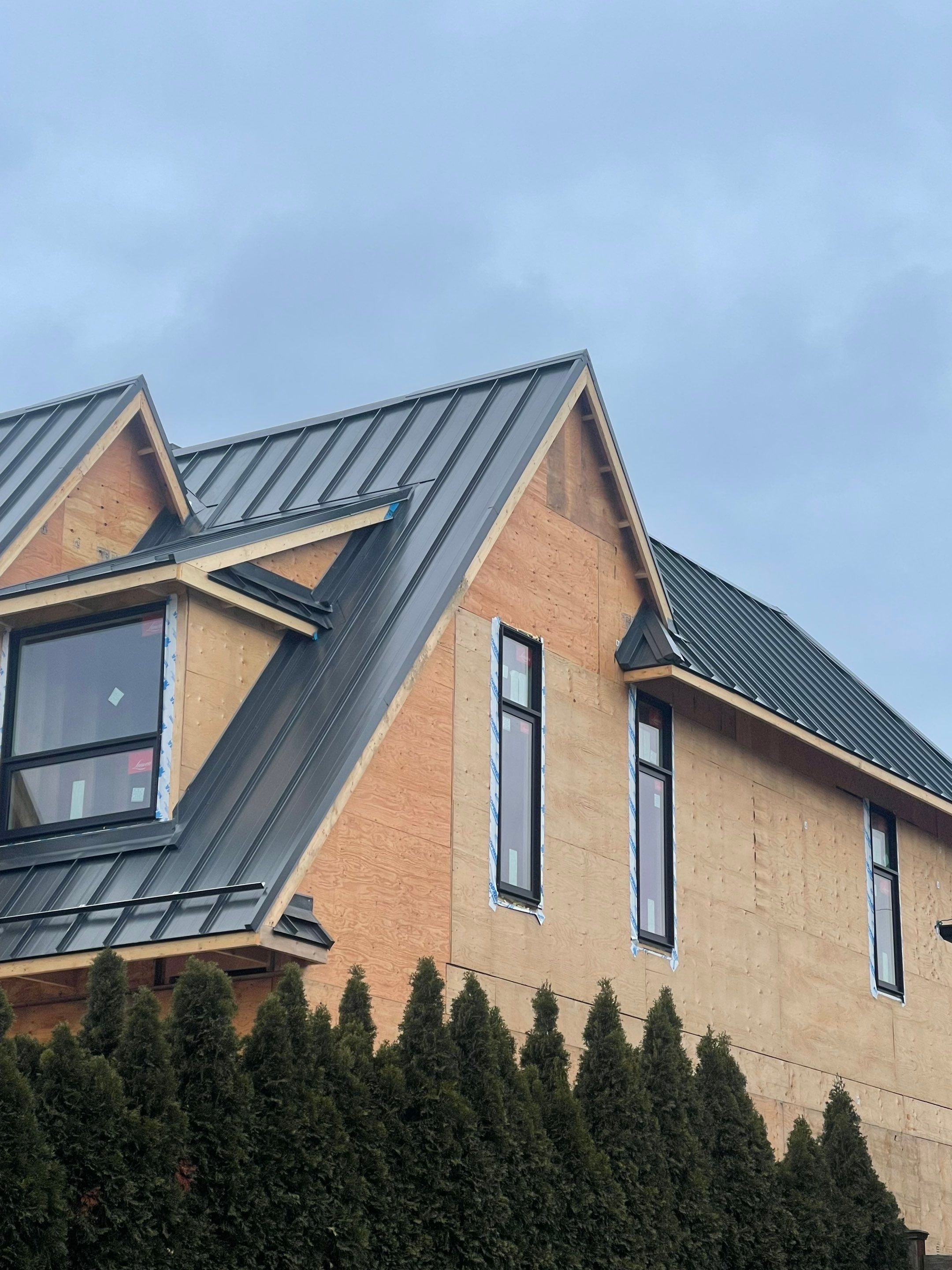 New Home Construction using 16" Standing Seam Panels by Jay Carter Roofing & Sheet Metal