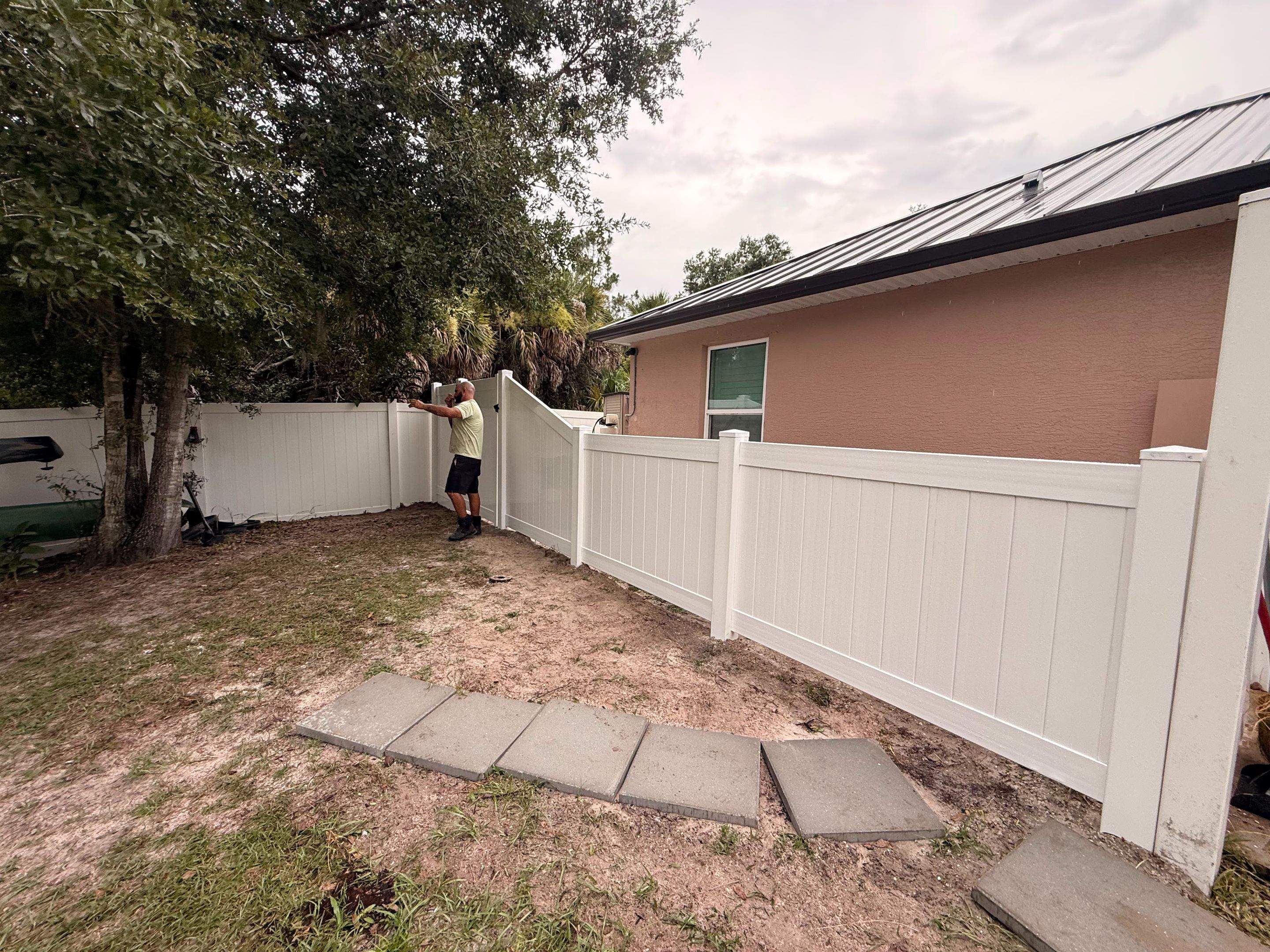 Vinyl Privacy Fence and Double Gate Installation in North Port by True Fence LLC