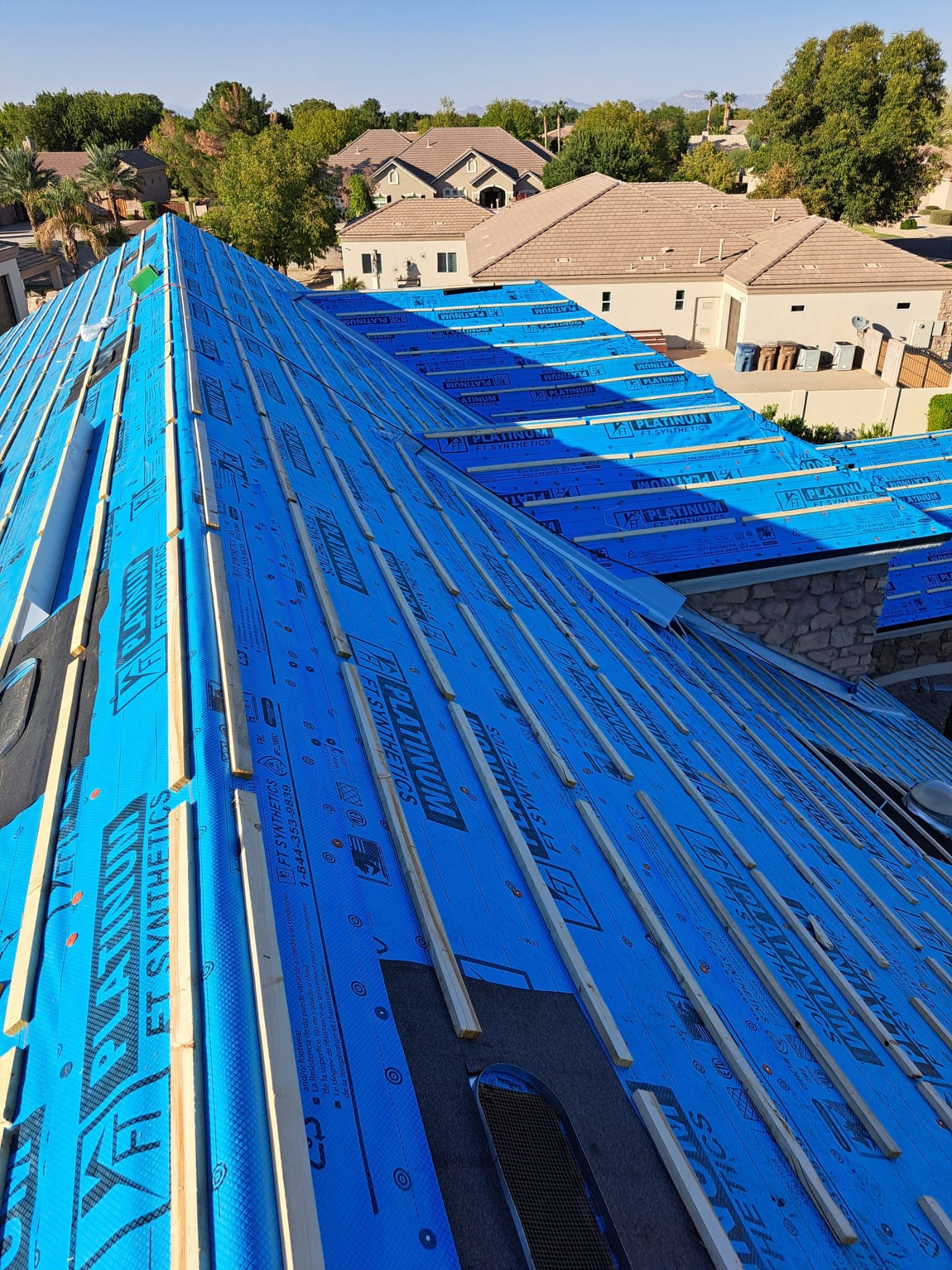 Gray Tile by Reimagine Roofing