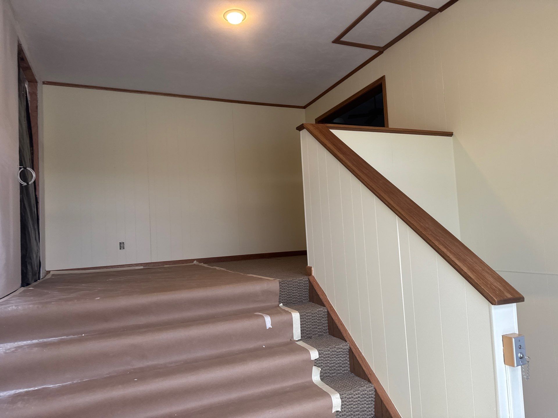 Interior Stairwell Transformation – Before & After by Midwest Paint LLC