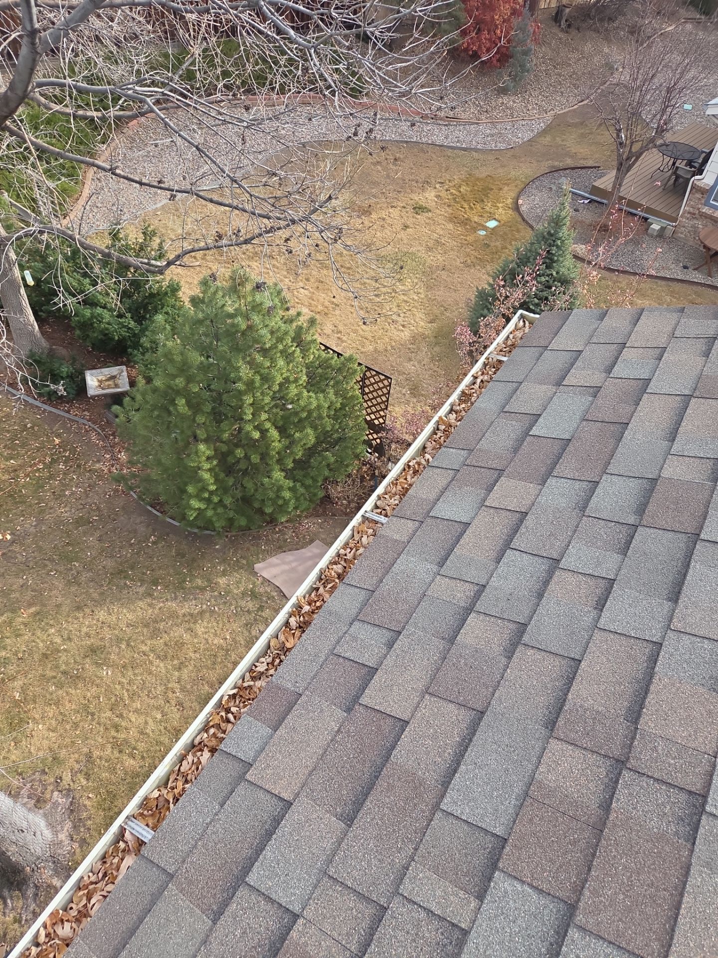 Clean Gutters and Downspouts by RTP Roofing Company