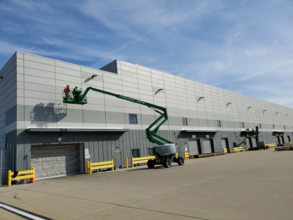 Tilt-up Precast Exterior Warehouse Painting by Paint Platoon USA