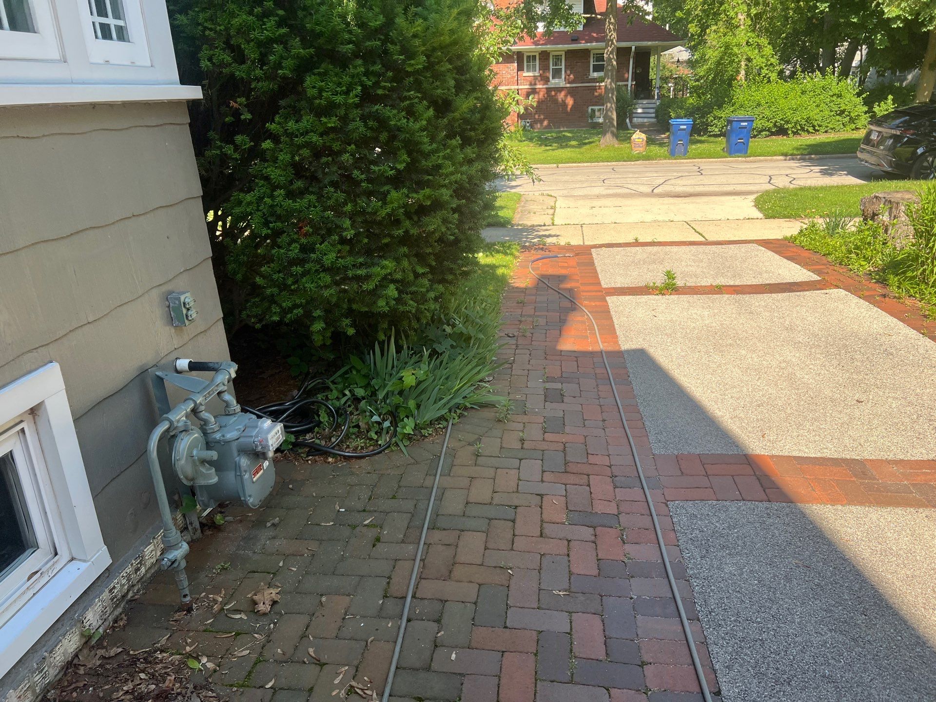 Brick paver cleaning and sealing by Northern Power Washing LLC.