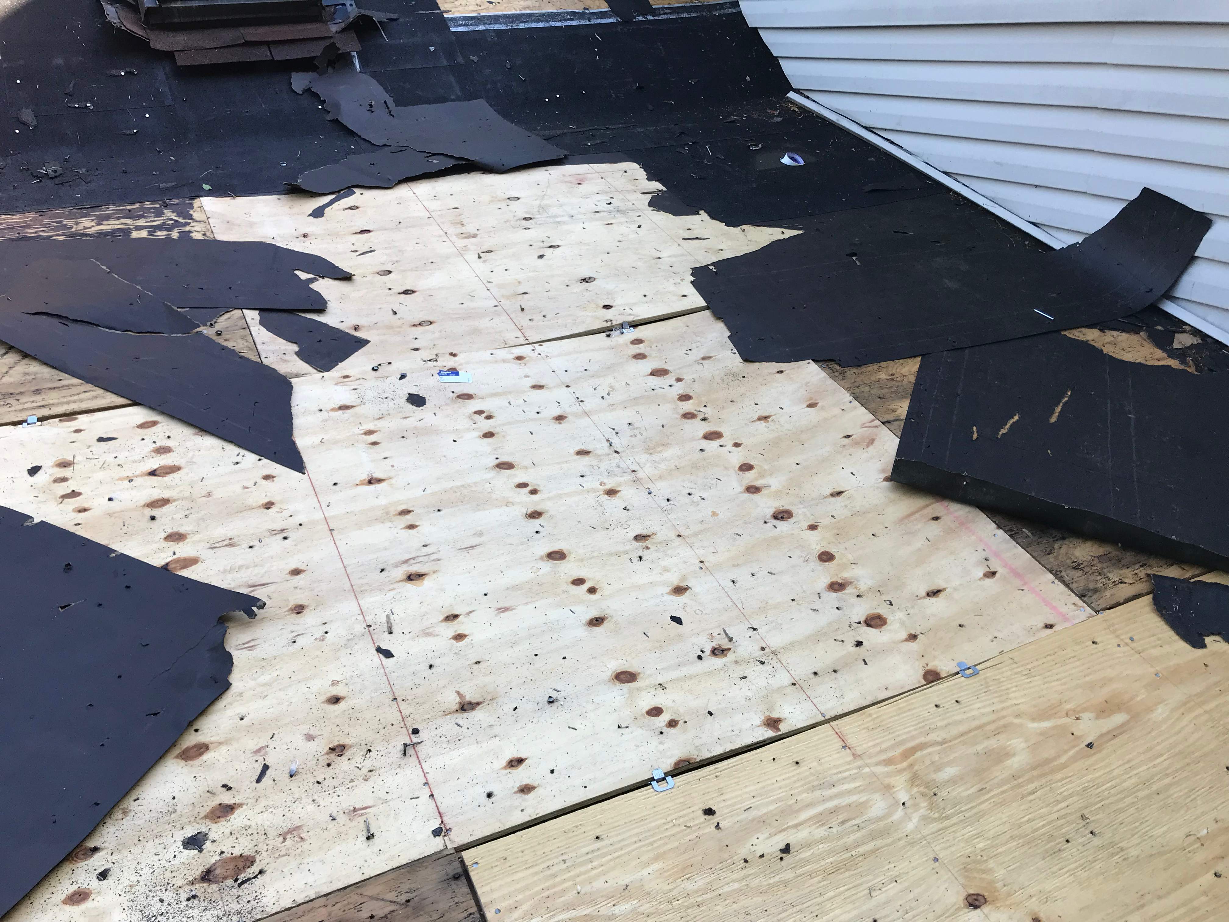 Residential Roofing Installation using Resawn Shake Shingles by Alpha Design Services