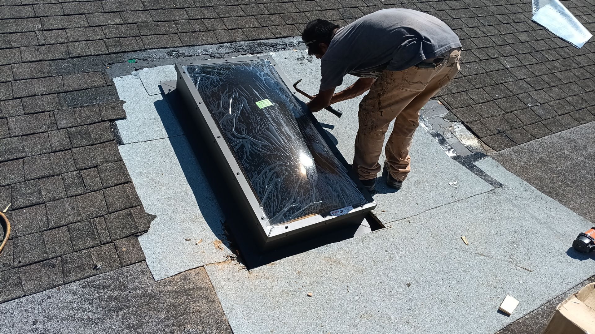 REPLACE NON APPROVED SKYLIGHT ALONG WITH CLOGED GUTTER by Morton Roofing, Inc.