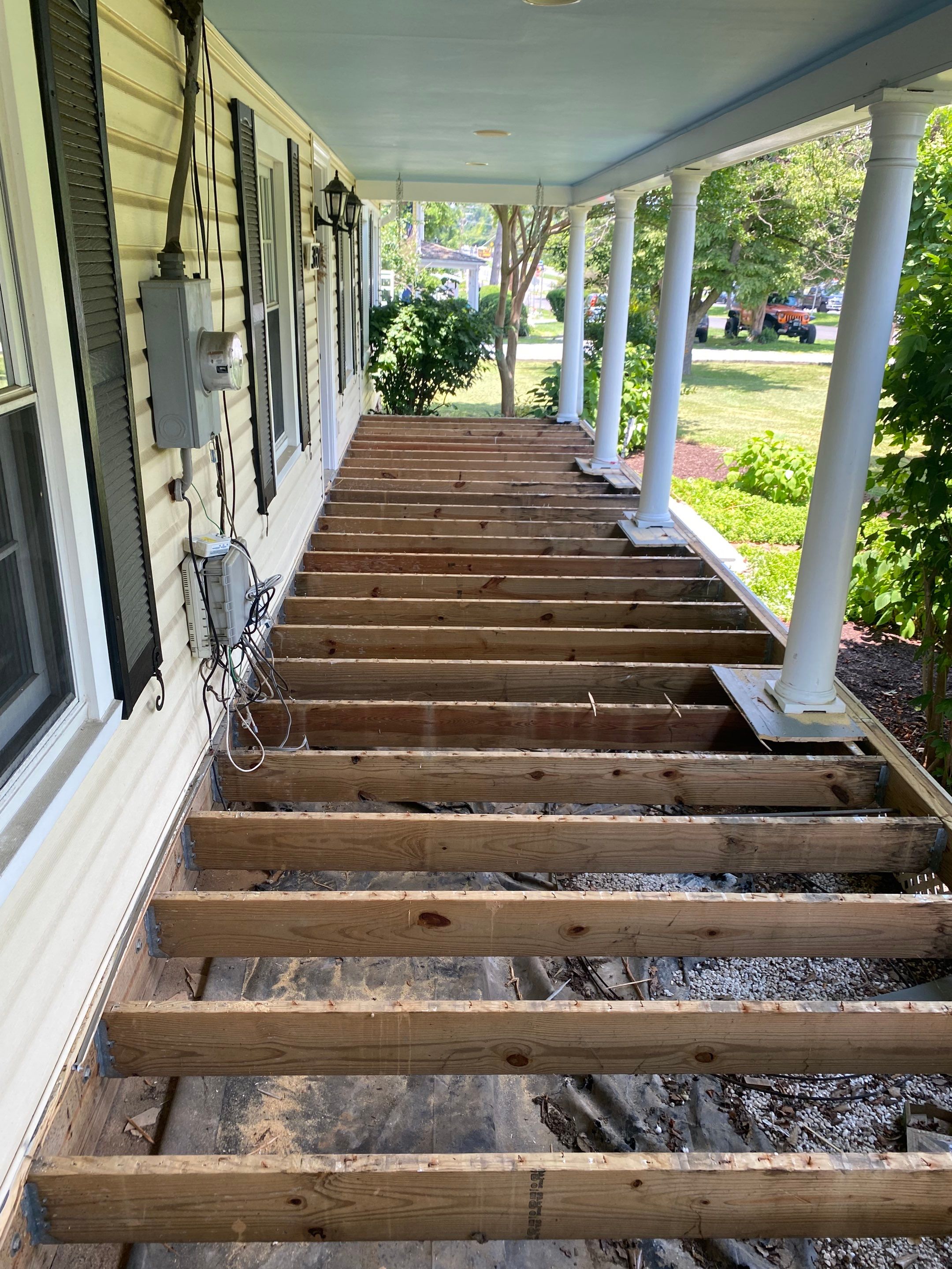 Front Porch Transformation using Timbertech Decking by The Smet Companies, LLC