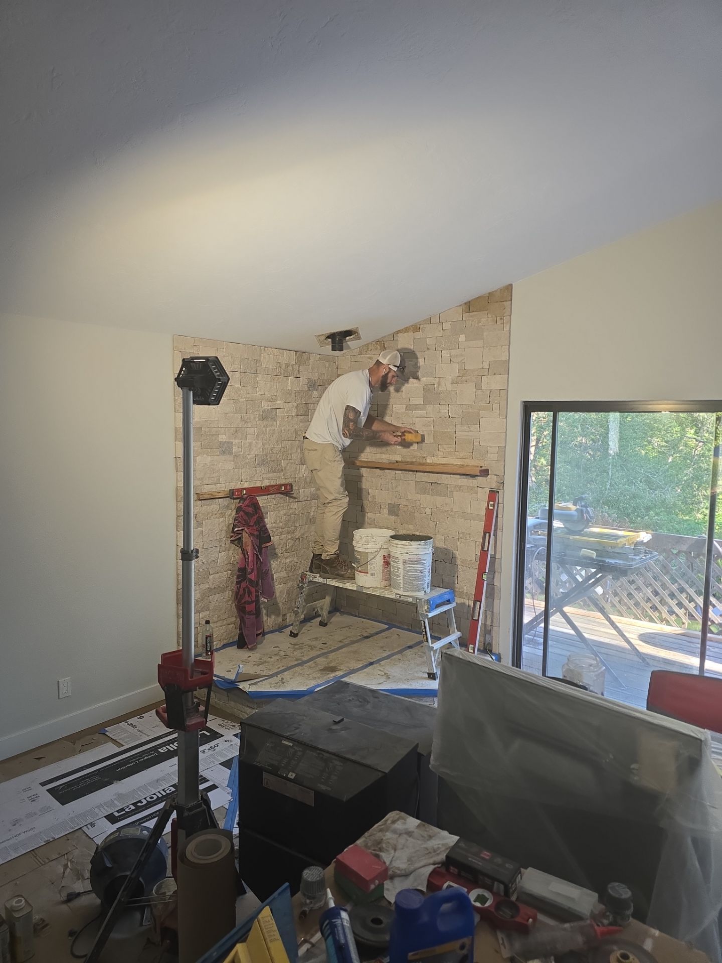 Full Interior Renovation Featuring Custom Tile Shower and Fireplace in Brookings by KMD Surfaces INC.