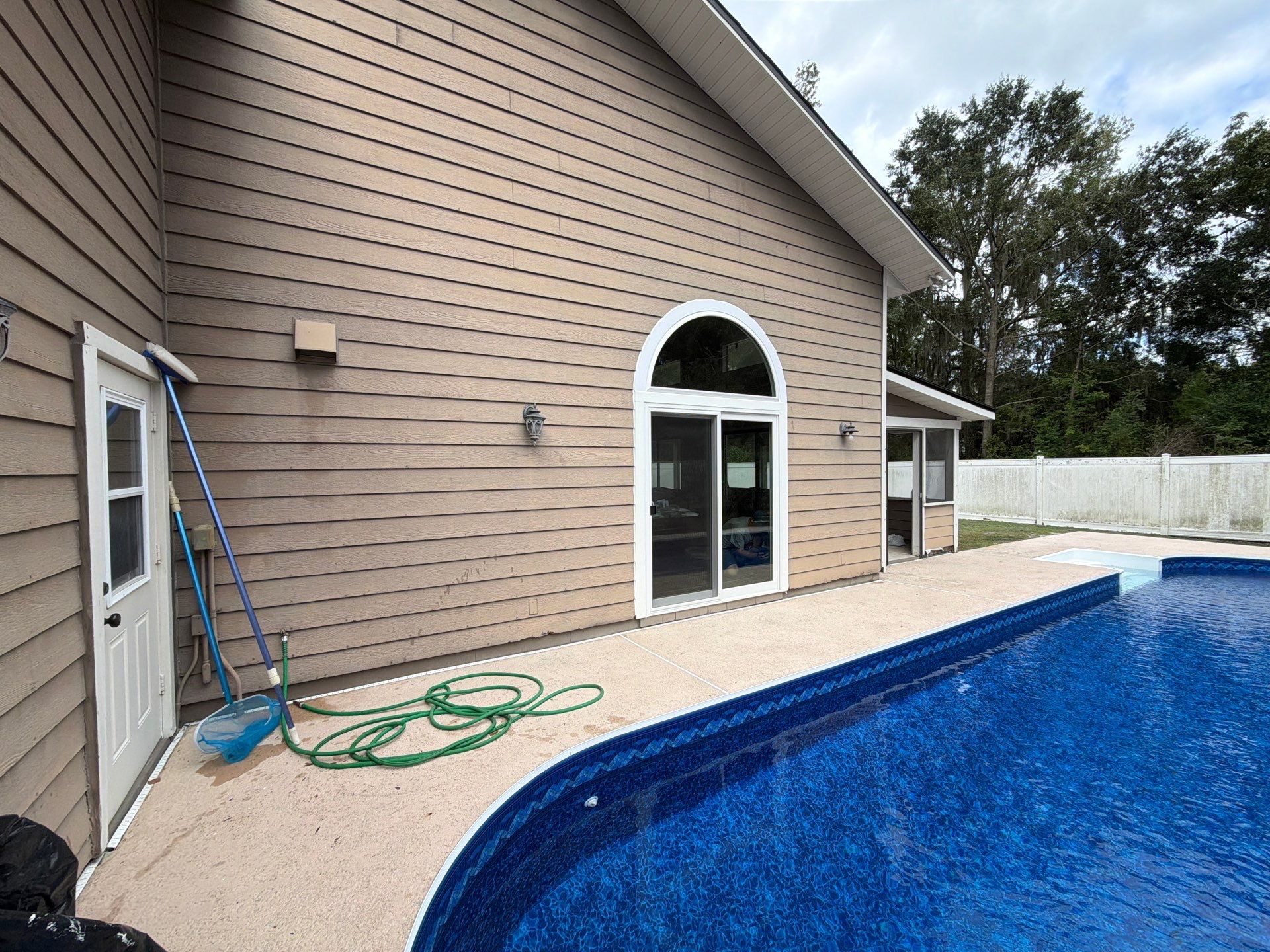 Custom Arched Transom and Sliding Patio Door Replacement in Gainesville by Windows & Doors Store