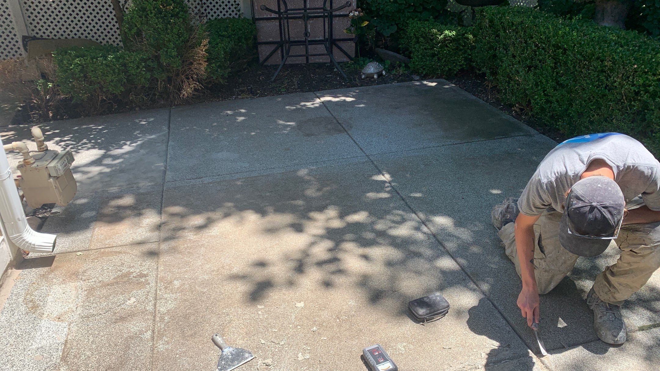 Patio using Domino  by Select Painting, Coatings & Garage Cabinets