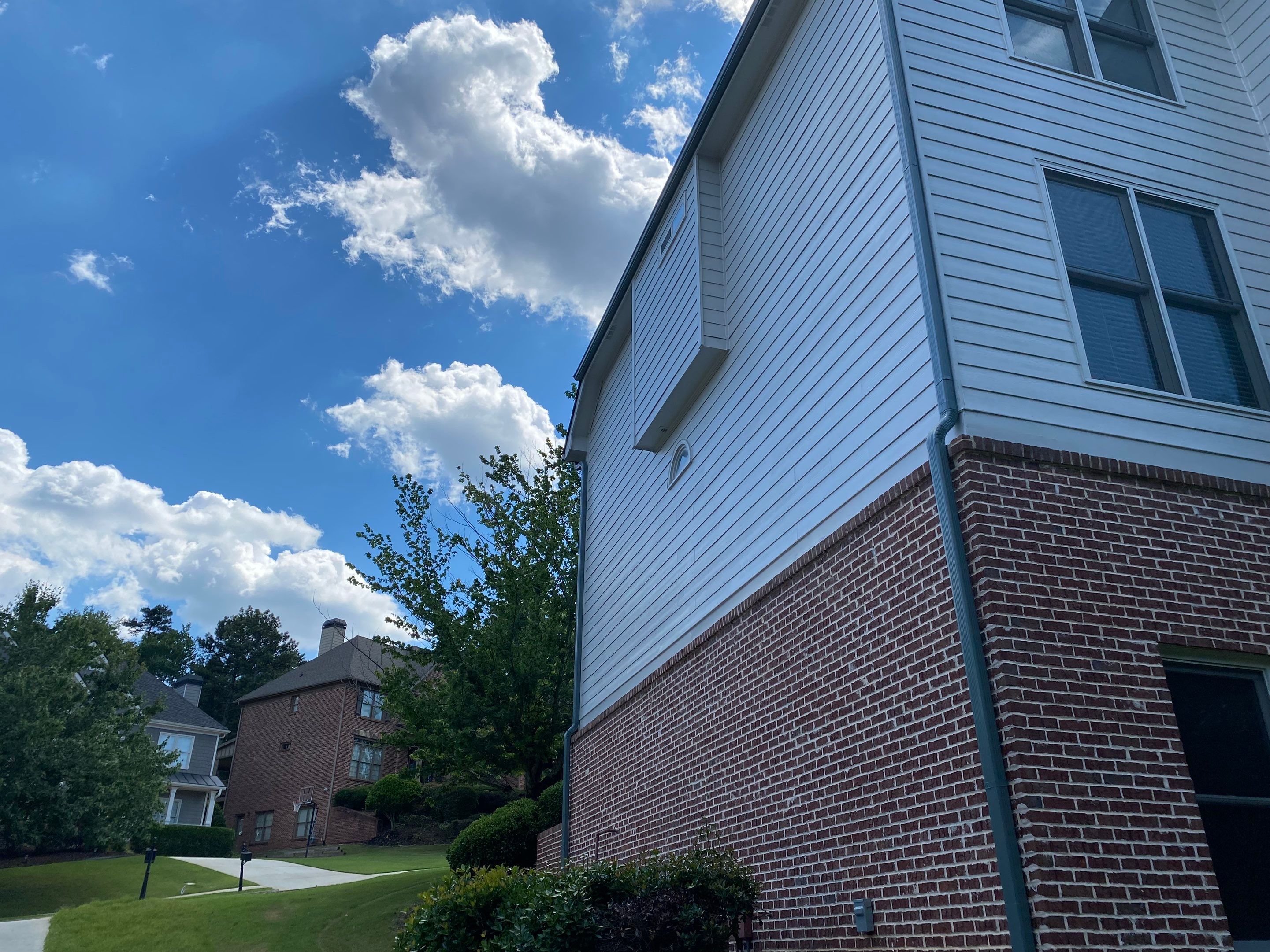 Exterior Painting and Deck Refinishing for Dacula Residential Home by Swift Home Renovations