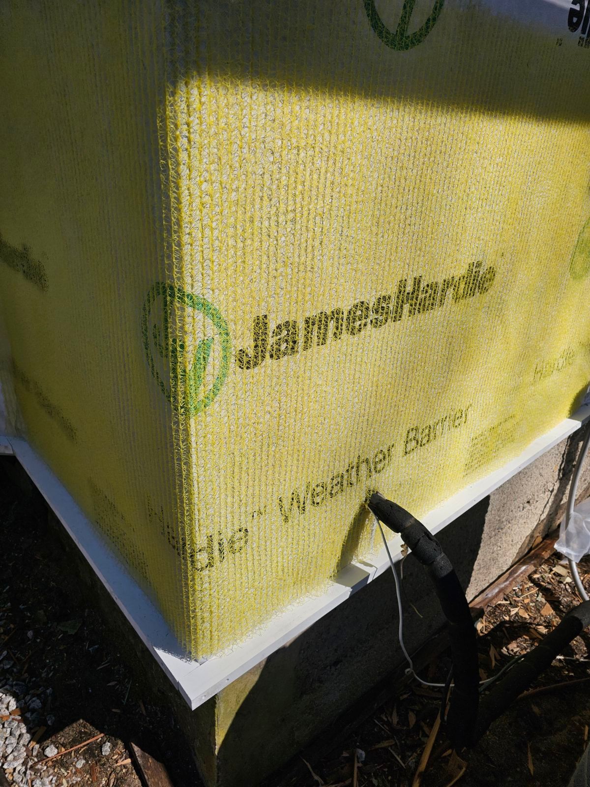 White cedar shingles and windows in Wayland, MA by UBrothers Construction