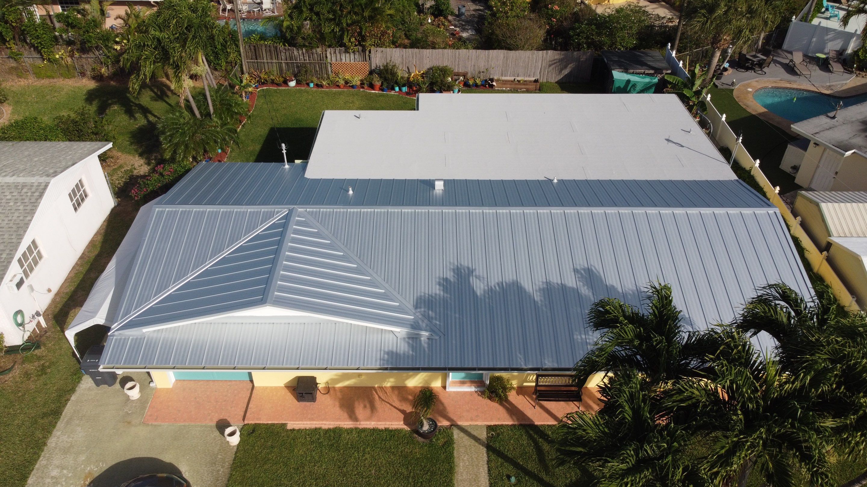 Residential Roofing Installation using 1" Nail strip metal roof by BLUES BROTHERS CONSTRUCTION CORP