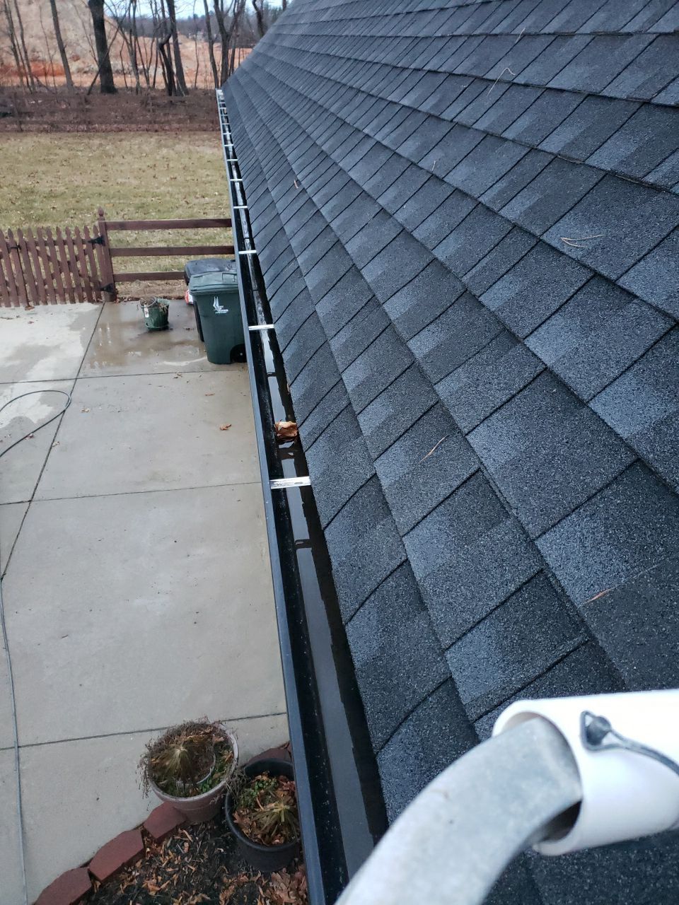 Gutter Cleaning using water by Power Wash Masters LLC