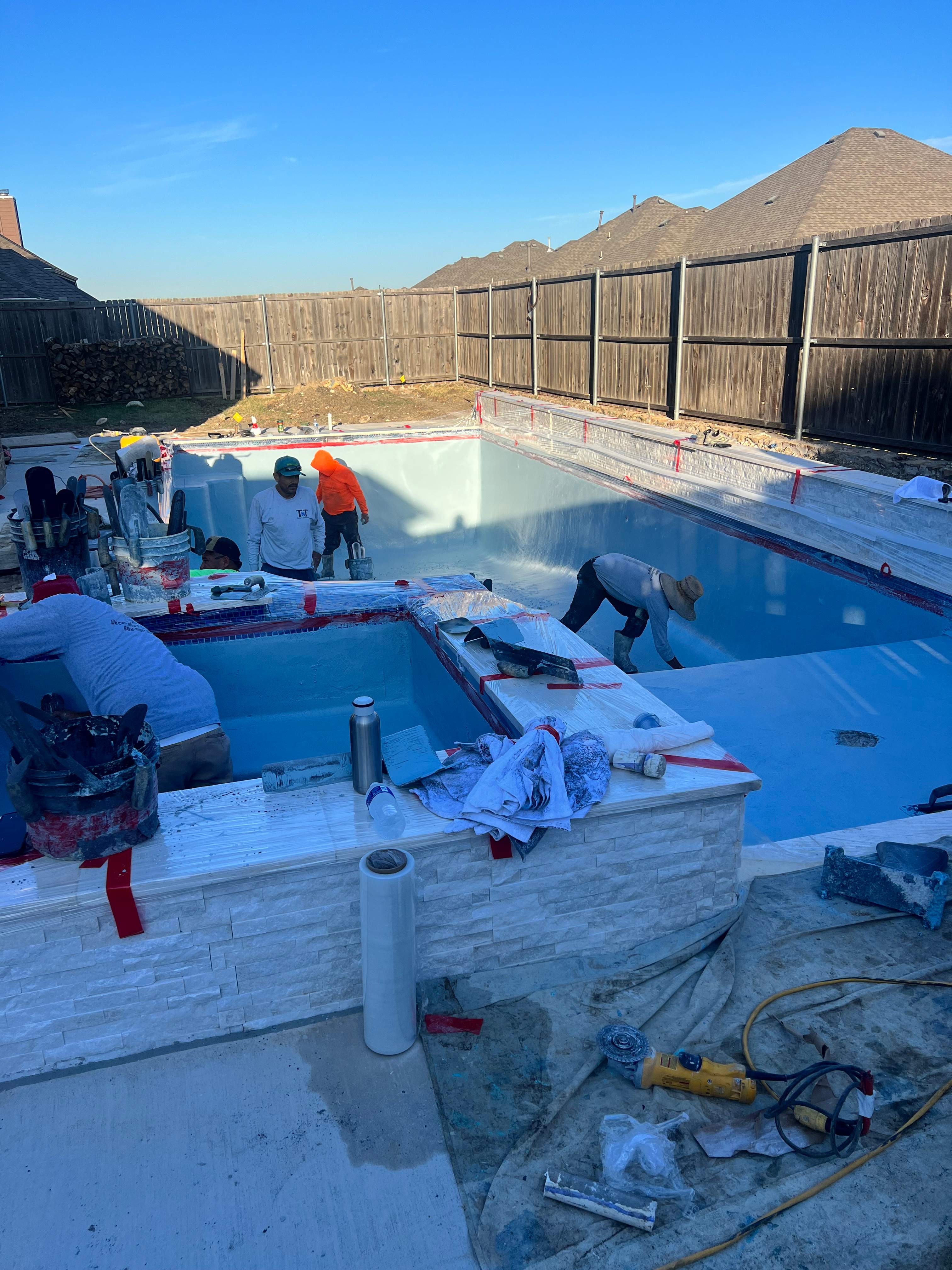Geometric Pool with Raised Spa and Sun Shelf by Pinnacle Pools and Spas - DFW
