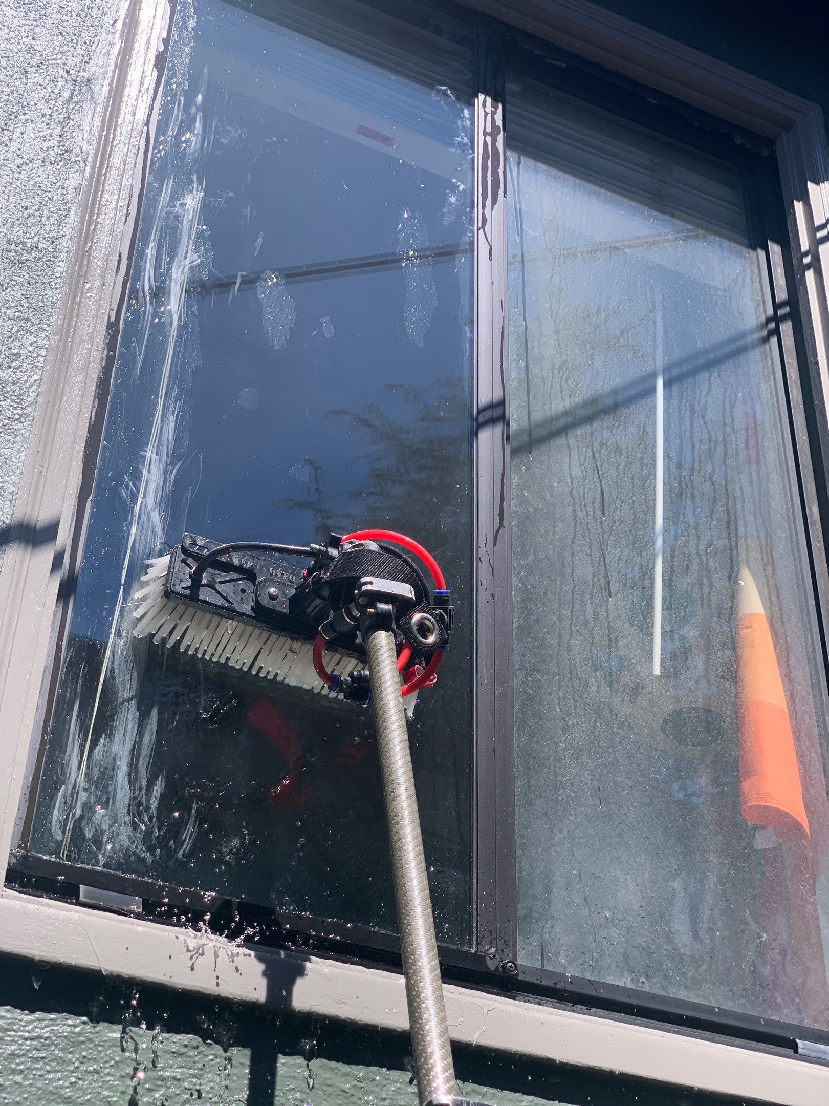 Exterior window cleaning using Pure Water Wash by SpotFree Window Cleaning