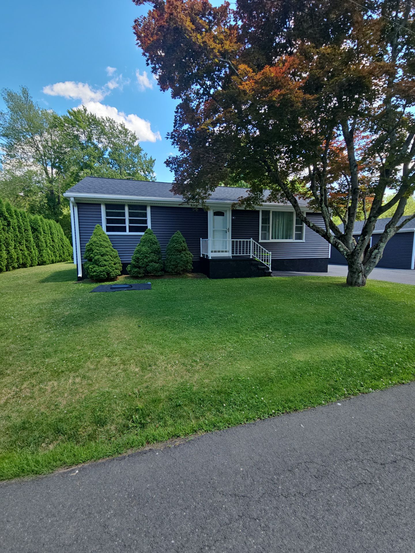 Siding Renewal with Cert Monogram D/4x12'6" clapboard Slate & Cert. Monogram D/4x25' clapboard Slate by DiGiorgi Roofing and Siding Inc