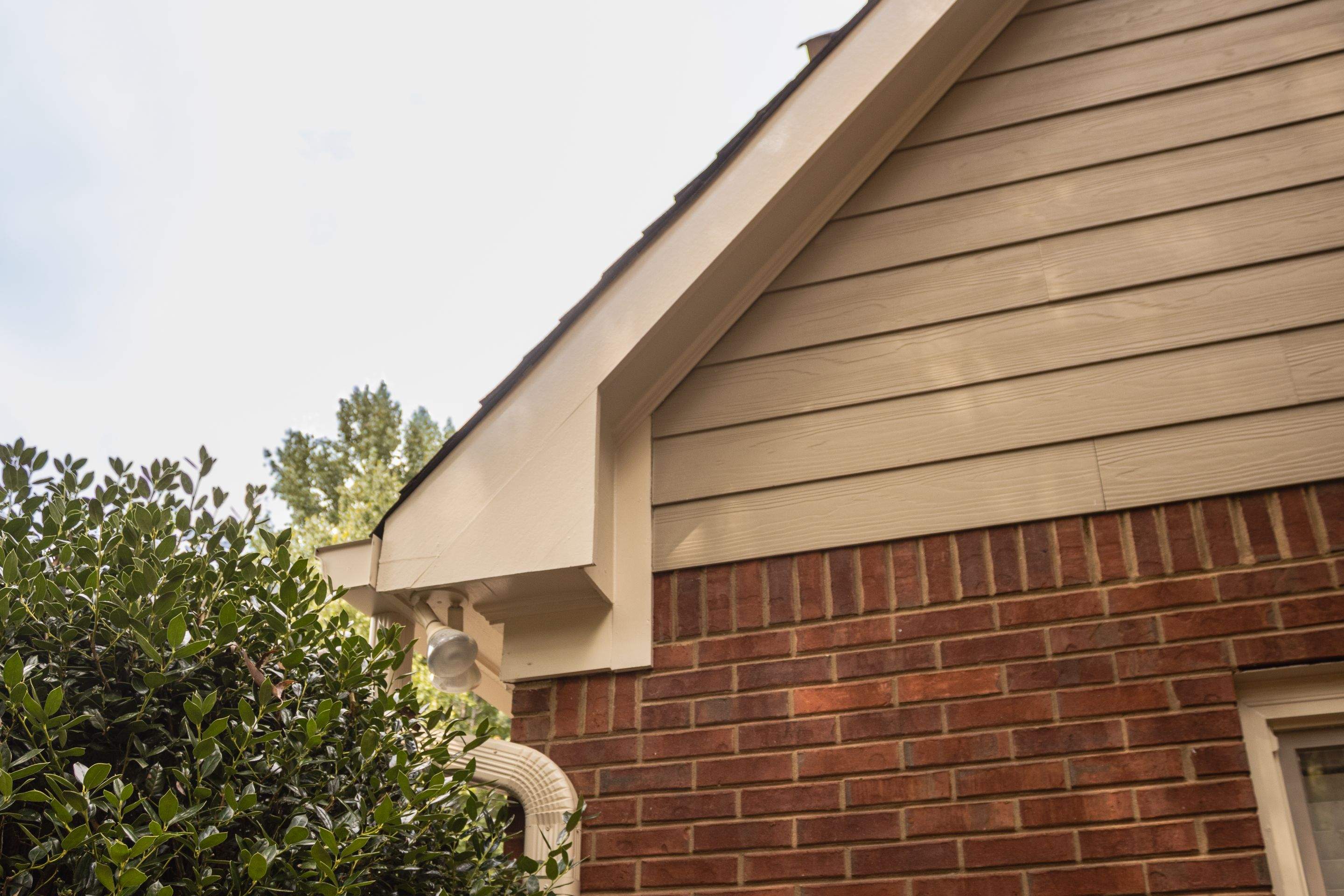 Marietta, GA Rotten Wood Replacement, Chimney Corner Board Installation, Gutter Replacement, and Exterior Painting by Nelson Exteriors