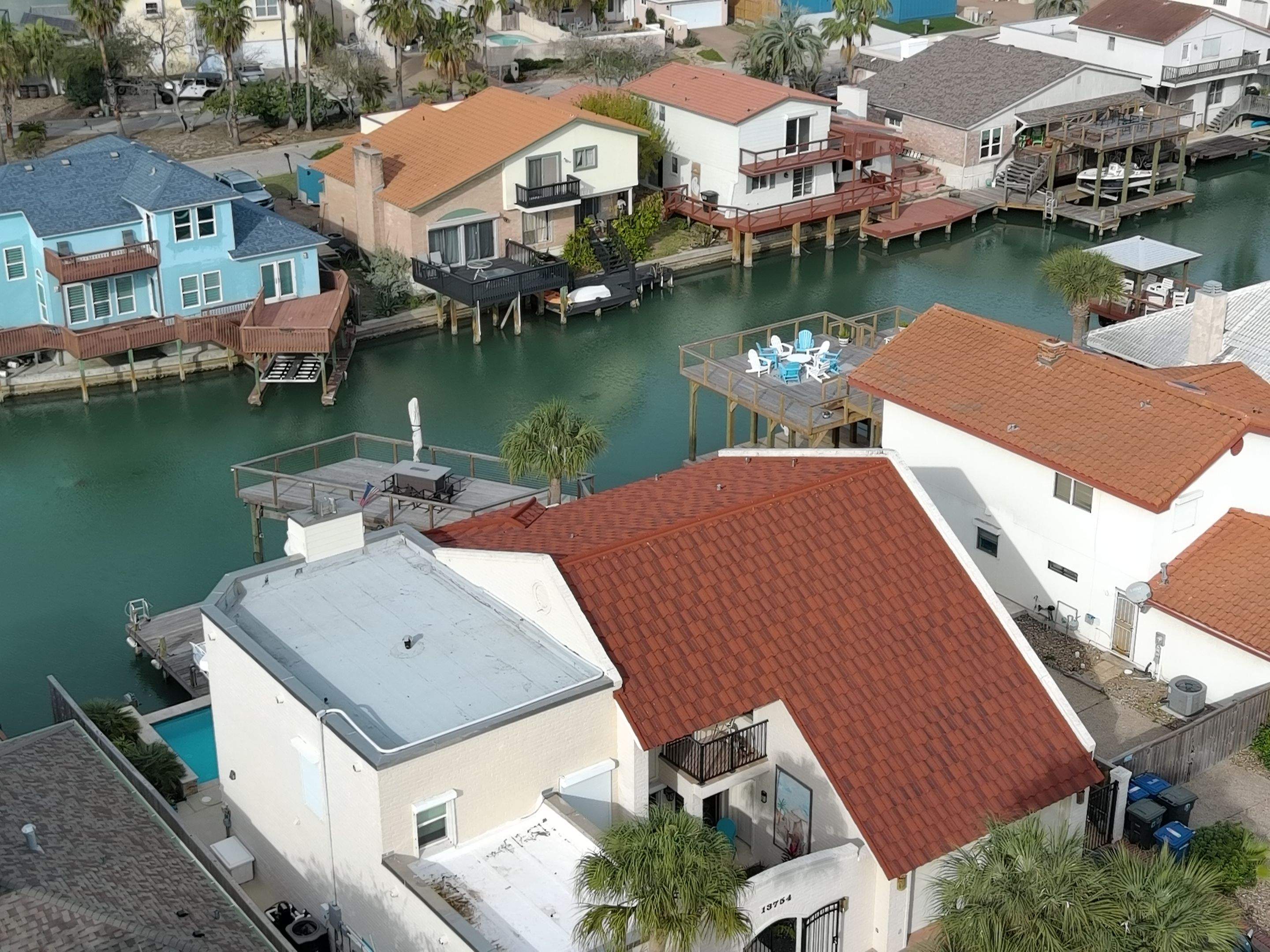 Off with the Tile and on with the TILCOR stone coated metal. by Bayfront Roofing and Construction