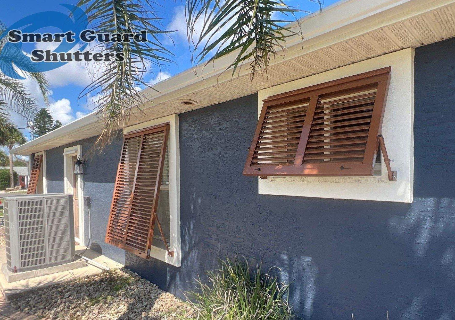Impact Rated Bahama Shutters in Beige Brown by Smart Guard Shutters