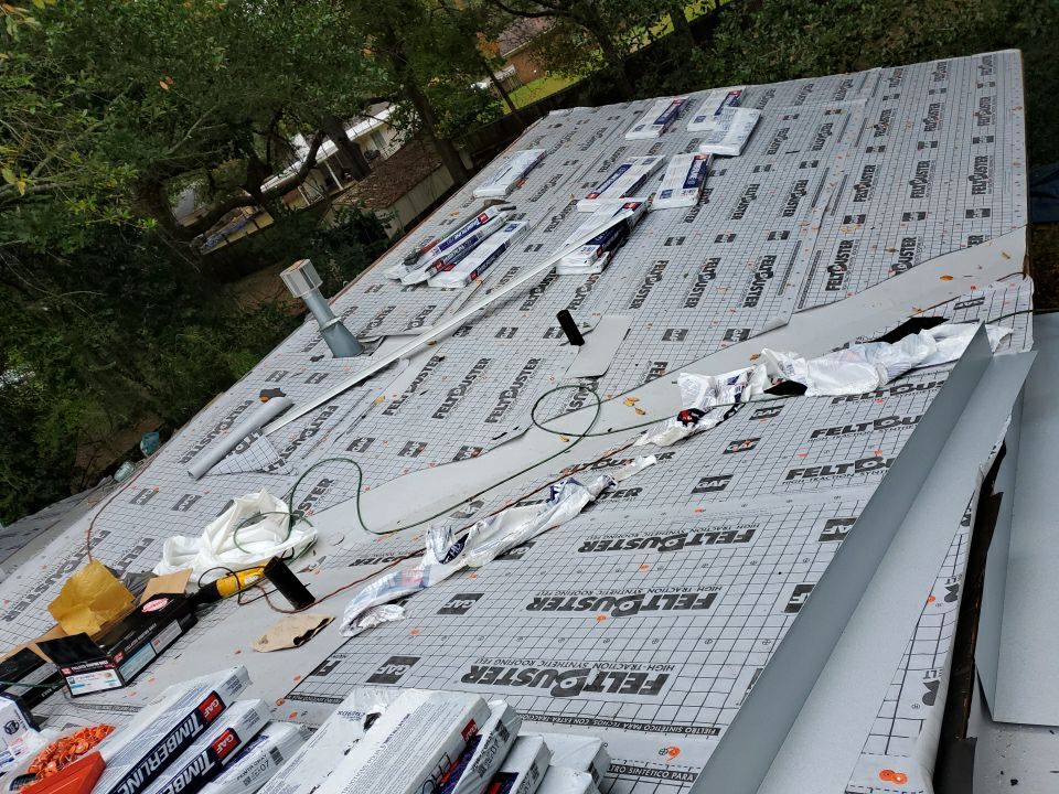 Residential Roofing Installation using Roof Replacement by American Roofing & Construction LLC