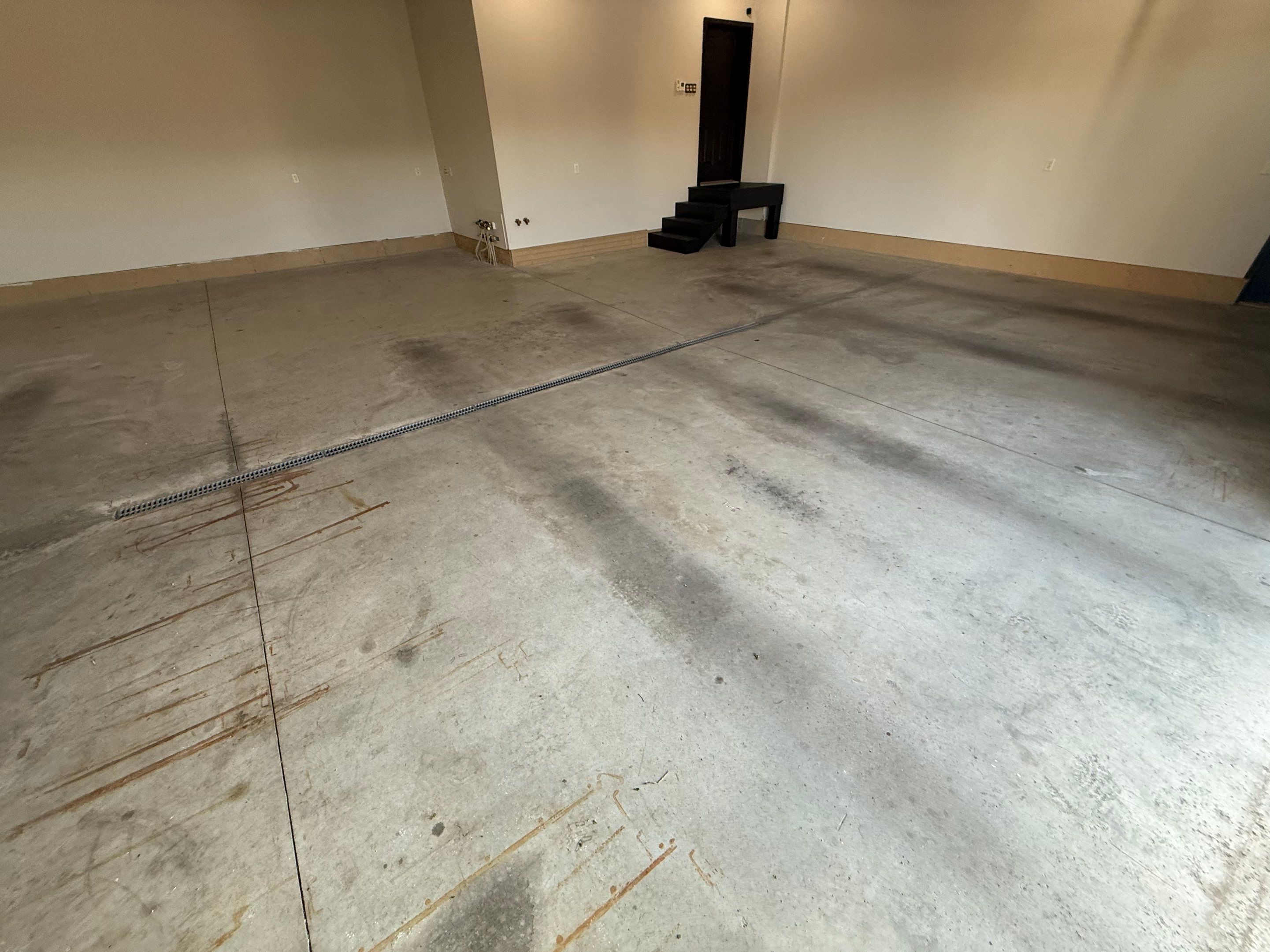 Multi-Car Garage Epoxy Floor Coating in Beresford by Select Painting, Coatings & Garage Cabinets