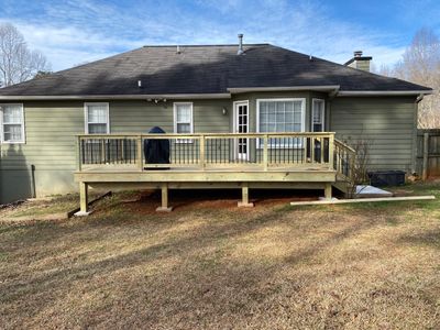 Raised Pressure-Treated Wood Deck Construction in Dallas, Georgia