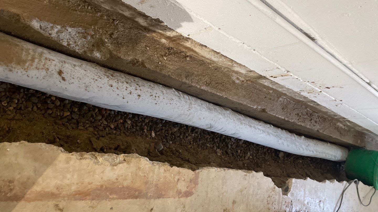 Interior Drain Tile & Foundation Crack Repair in St. Anthony, MN by Waterproofing Northeast