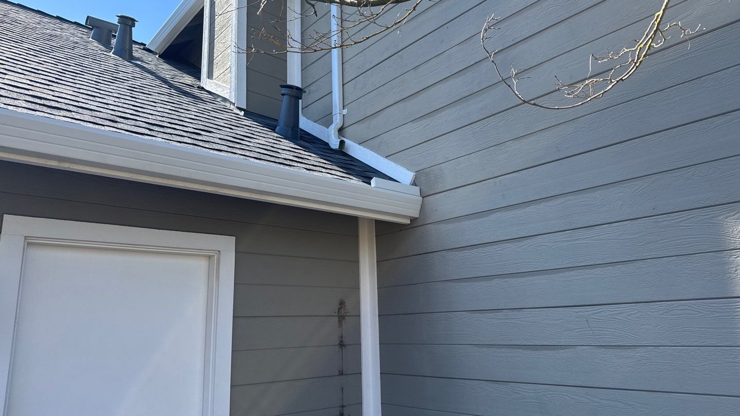 New shingles and gutters using GAF Timberline HDZ shingles and aluminum gutter by Straight Edge Roofing Inc