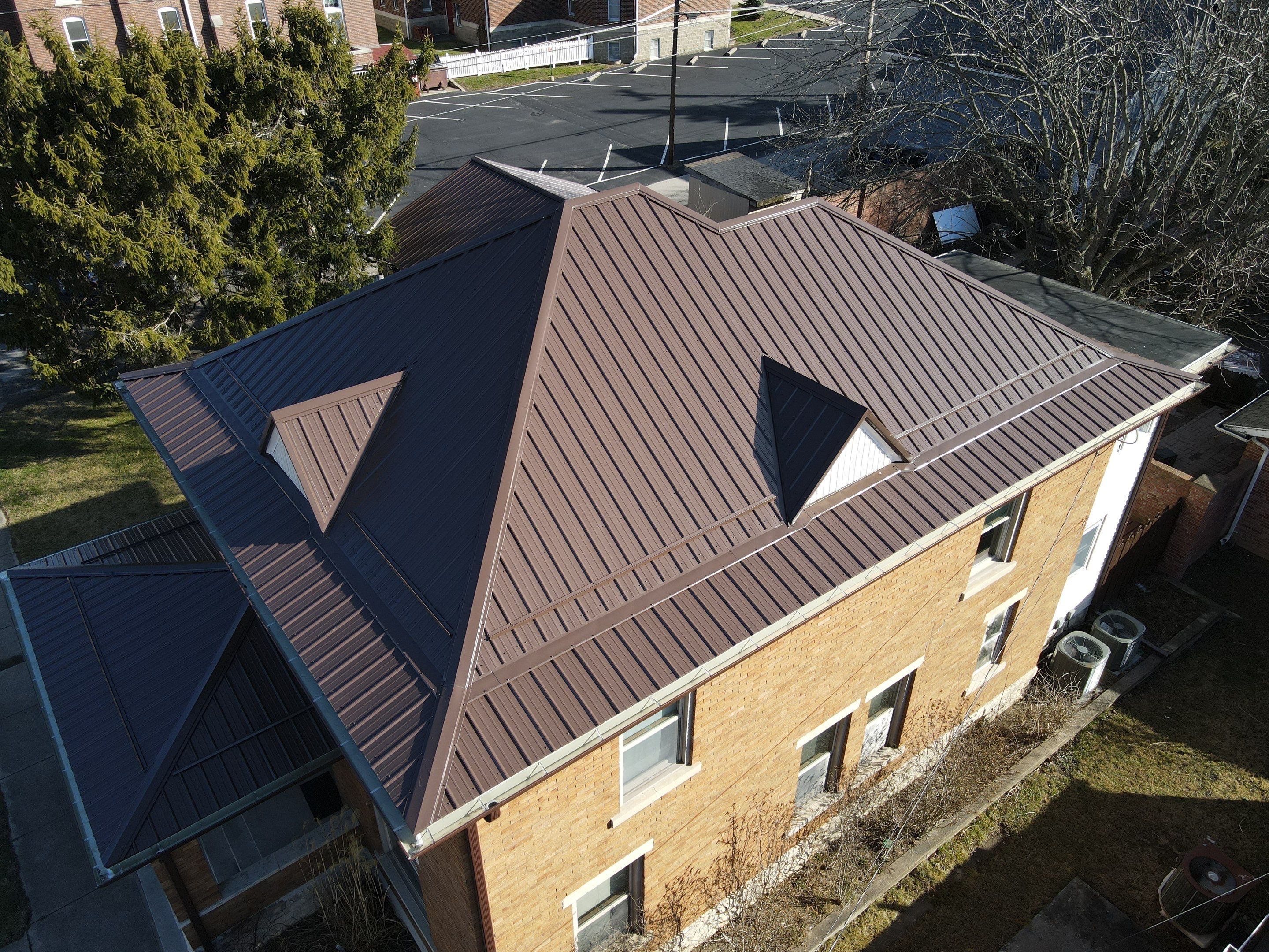Residential Roofing Installation using Performance Panel Metal - Brown by RoofX