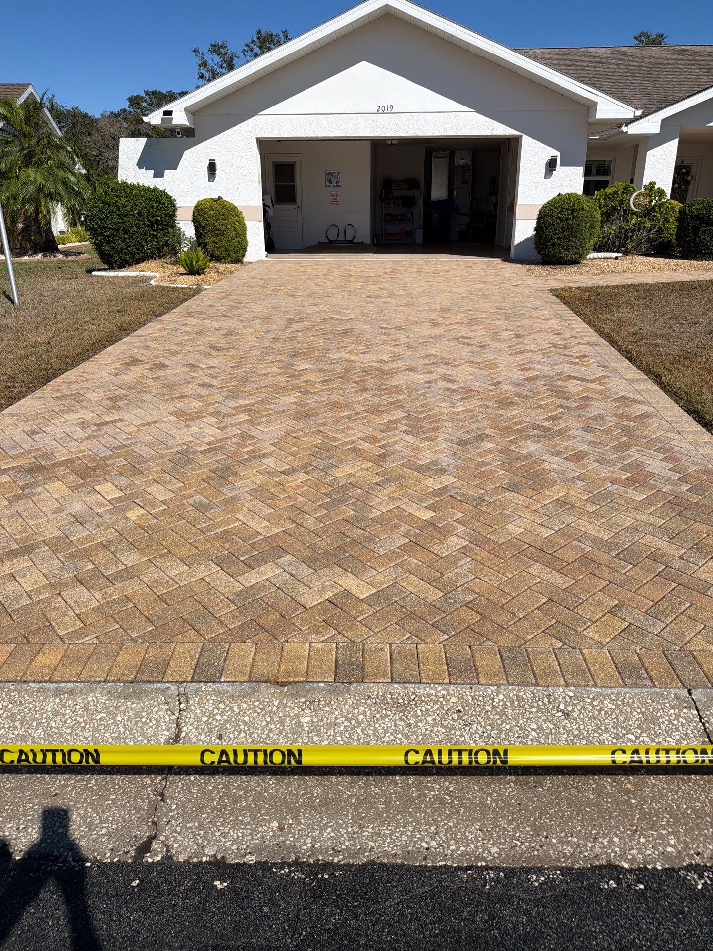 Restoring Herringbone Paver Driveway and Walkway in Sun City Center by Supreme Paver Experts
