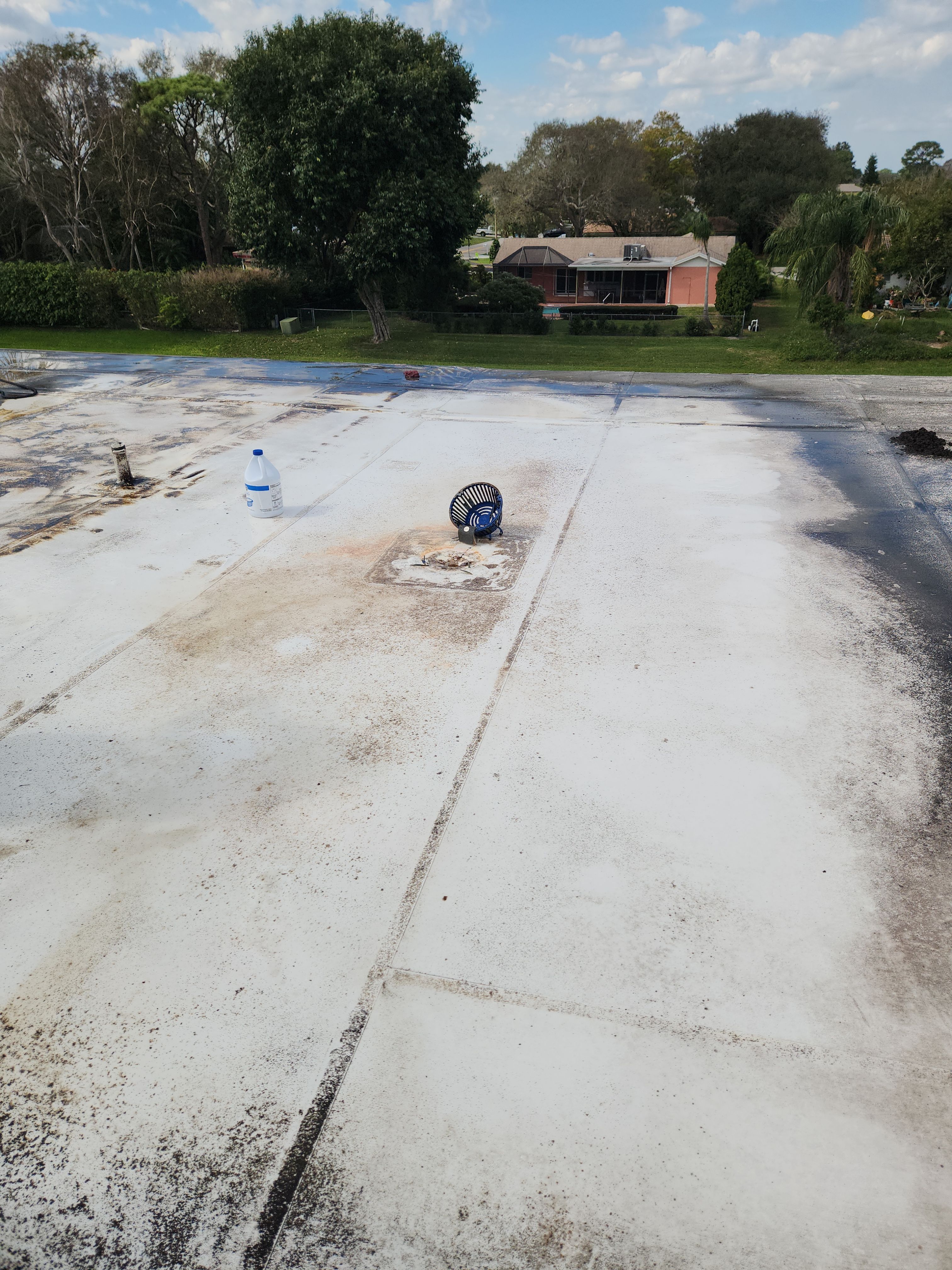 Reflective Silicone Roof Coating and Maintenance in Palm Beach Gardens by Aastro Roofing