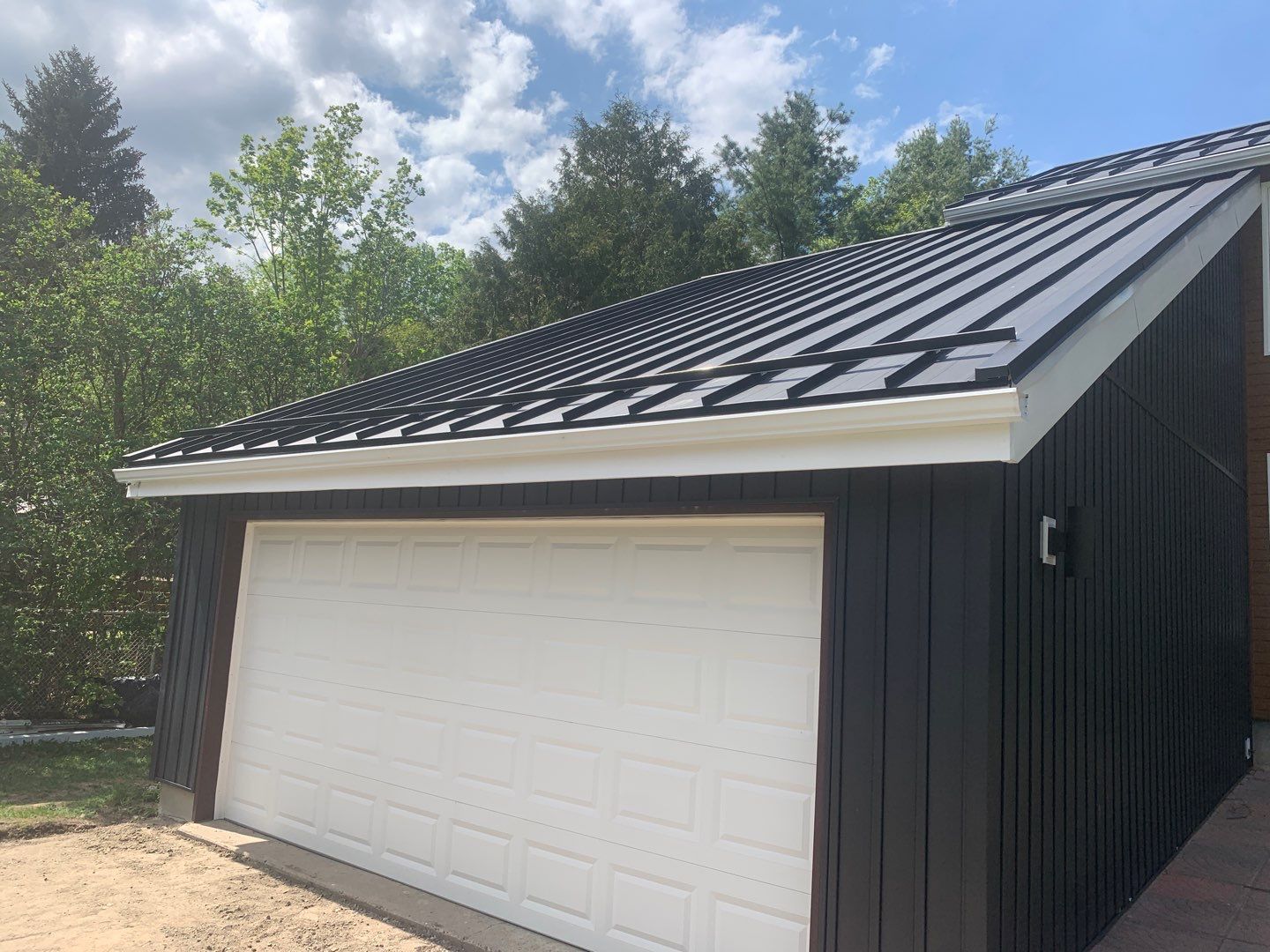 Residential Roofing Installation using 16" Standing Seam Panels by Jay Carter Roofing & Sheet Metal