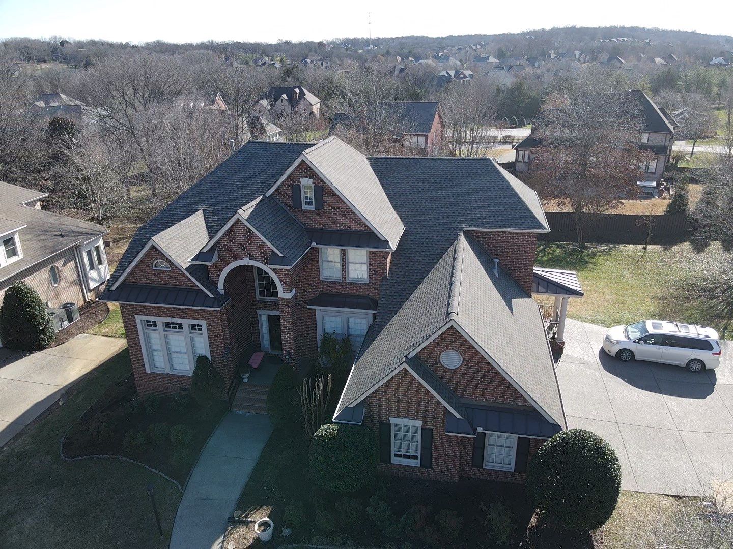 Residential Roofing Installation using GAF Timberline HDZ Weathered Wood Shingles by Undersun Roofing 