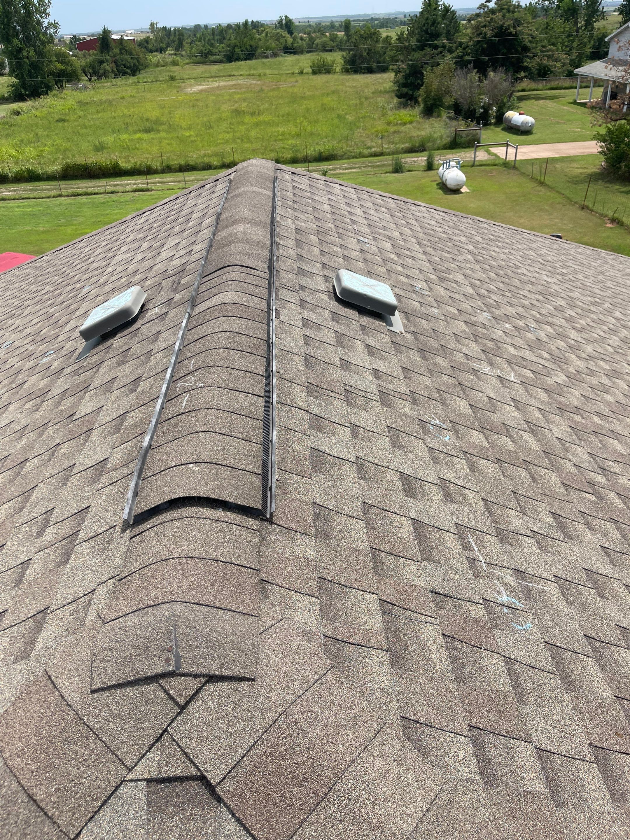 Hail Damage on a Roofing System by Icon Roofing And Construction 