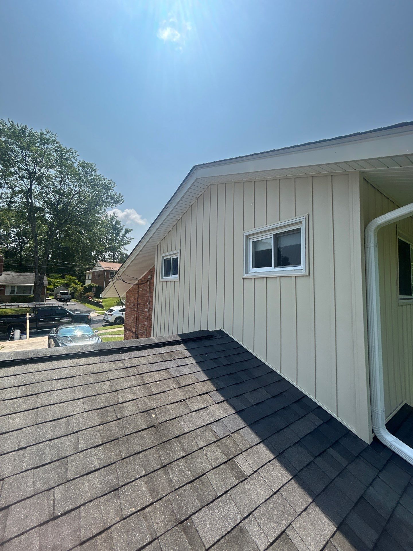 Fairfax: Residential Siding Replacement with CertainTeed 8" Board and Batten Siding in Desert Tan by RM Banning, Inc.