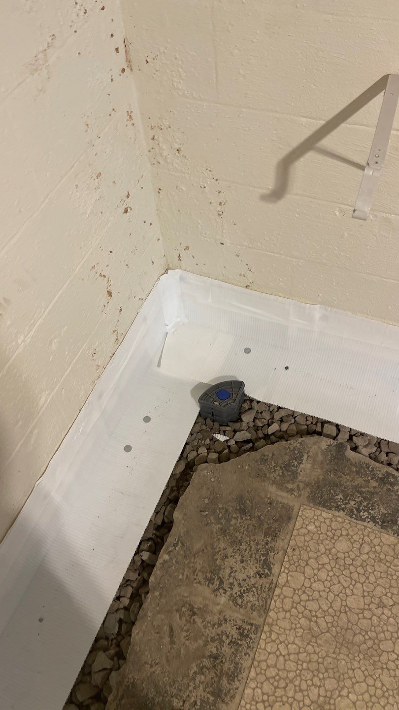 Interior Waterproofing Using GrateDrain™ Products by Toledo Basement Repair